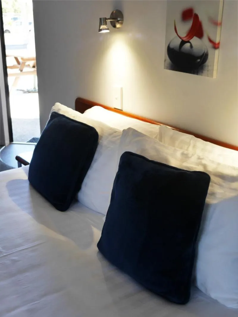 Bed in BK's Magnolia Motor Lodge