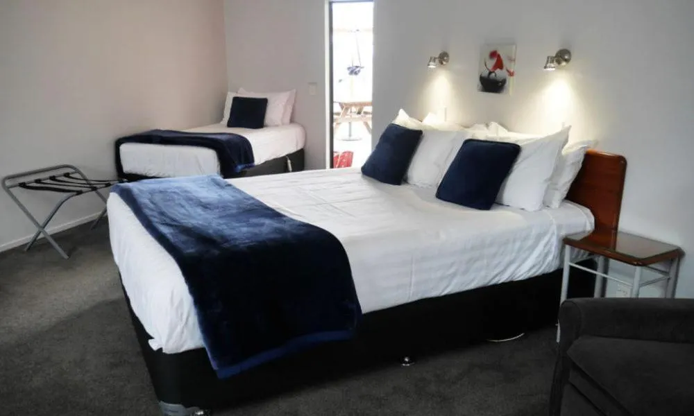 Bed in BK's Magnolia Motor Lodge