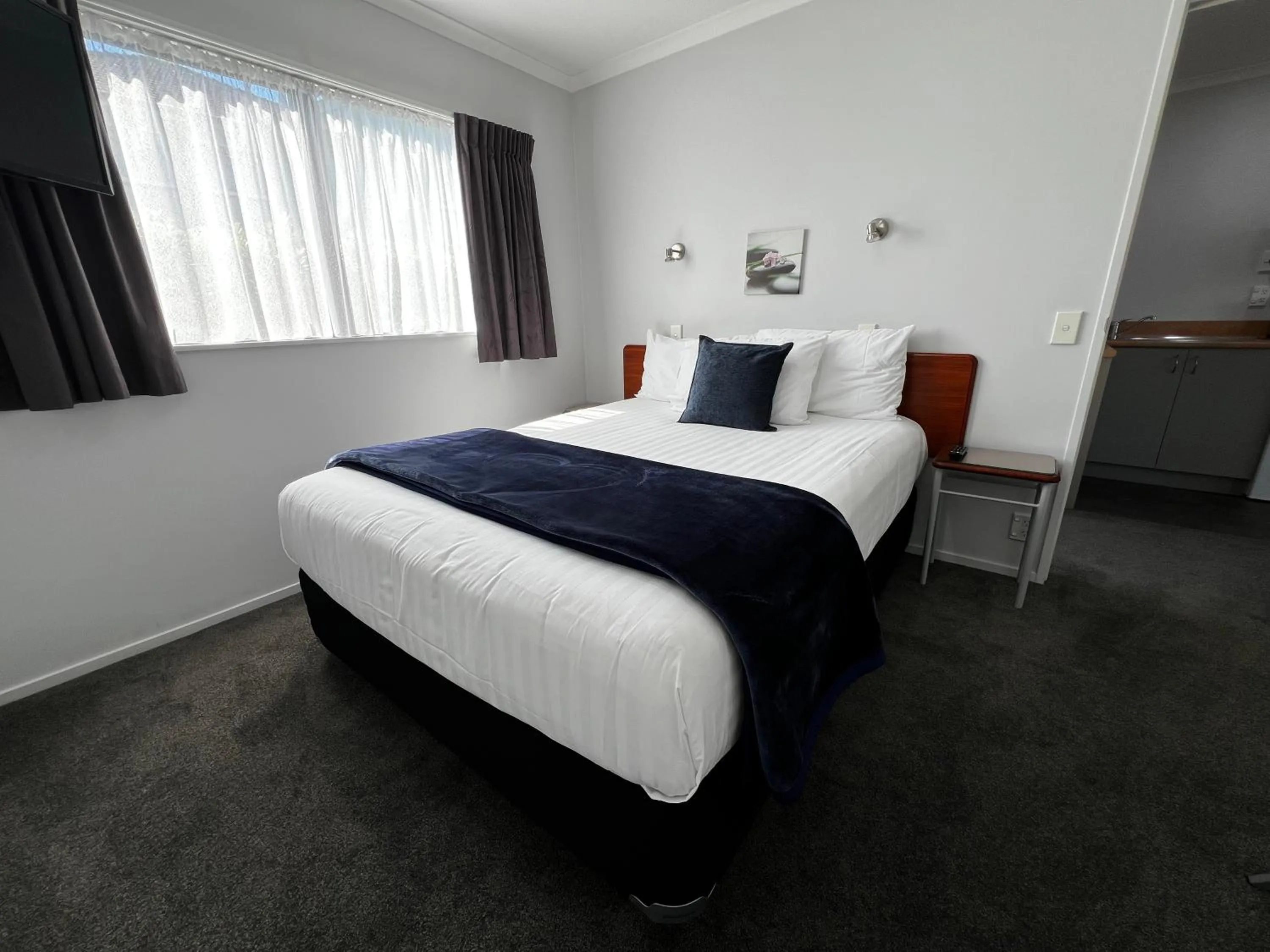 Bed in BK's Magnolia Motor Lodge