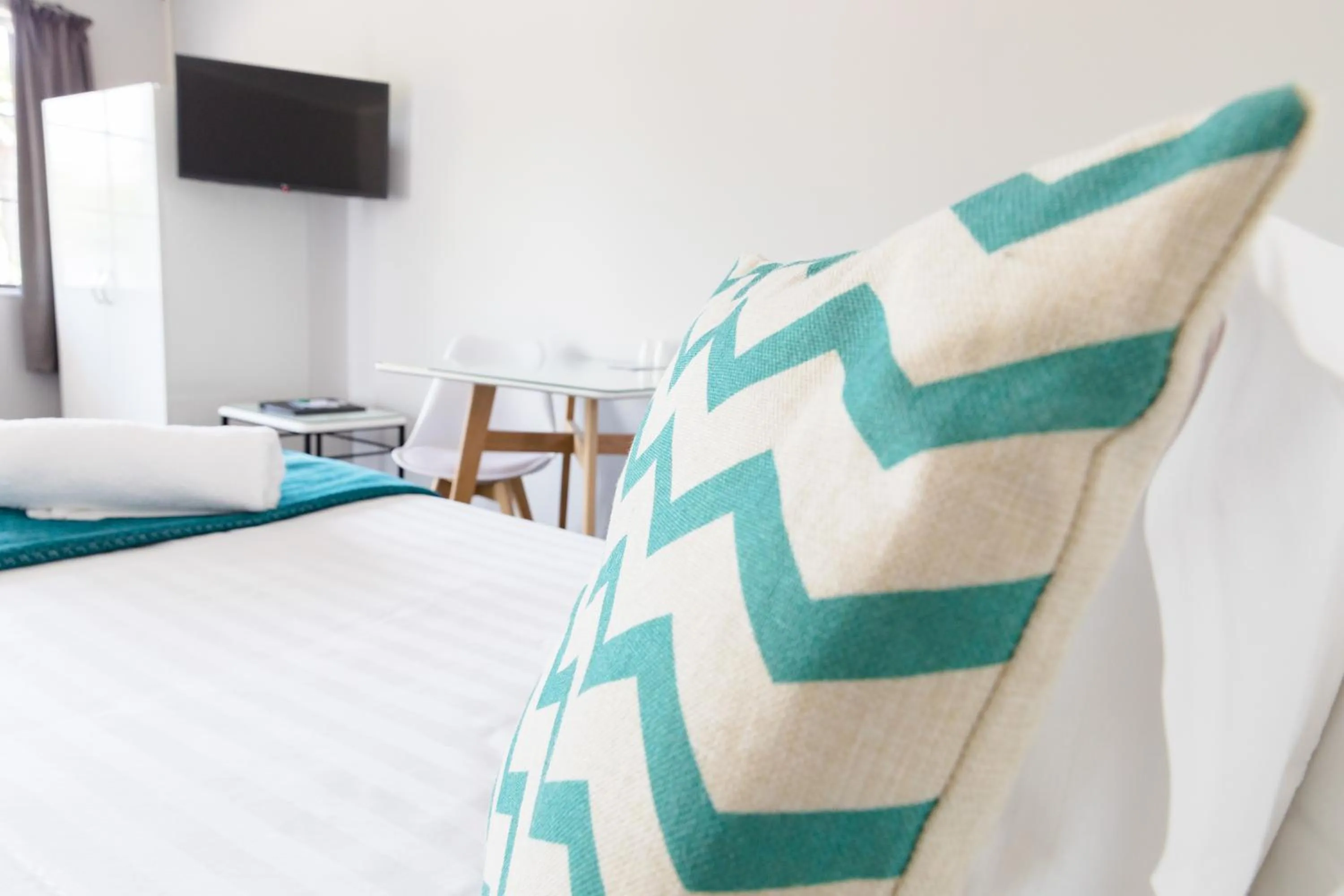 Bed in BKs Palm Court Motor Lodge