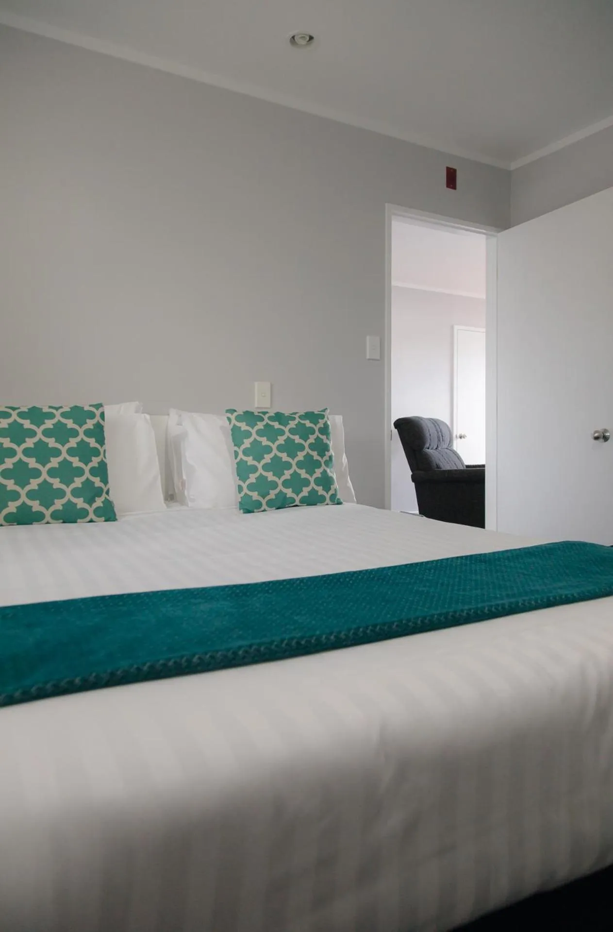 Bed in BKs Palm Court Motor Lodge