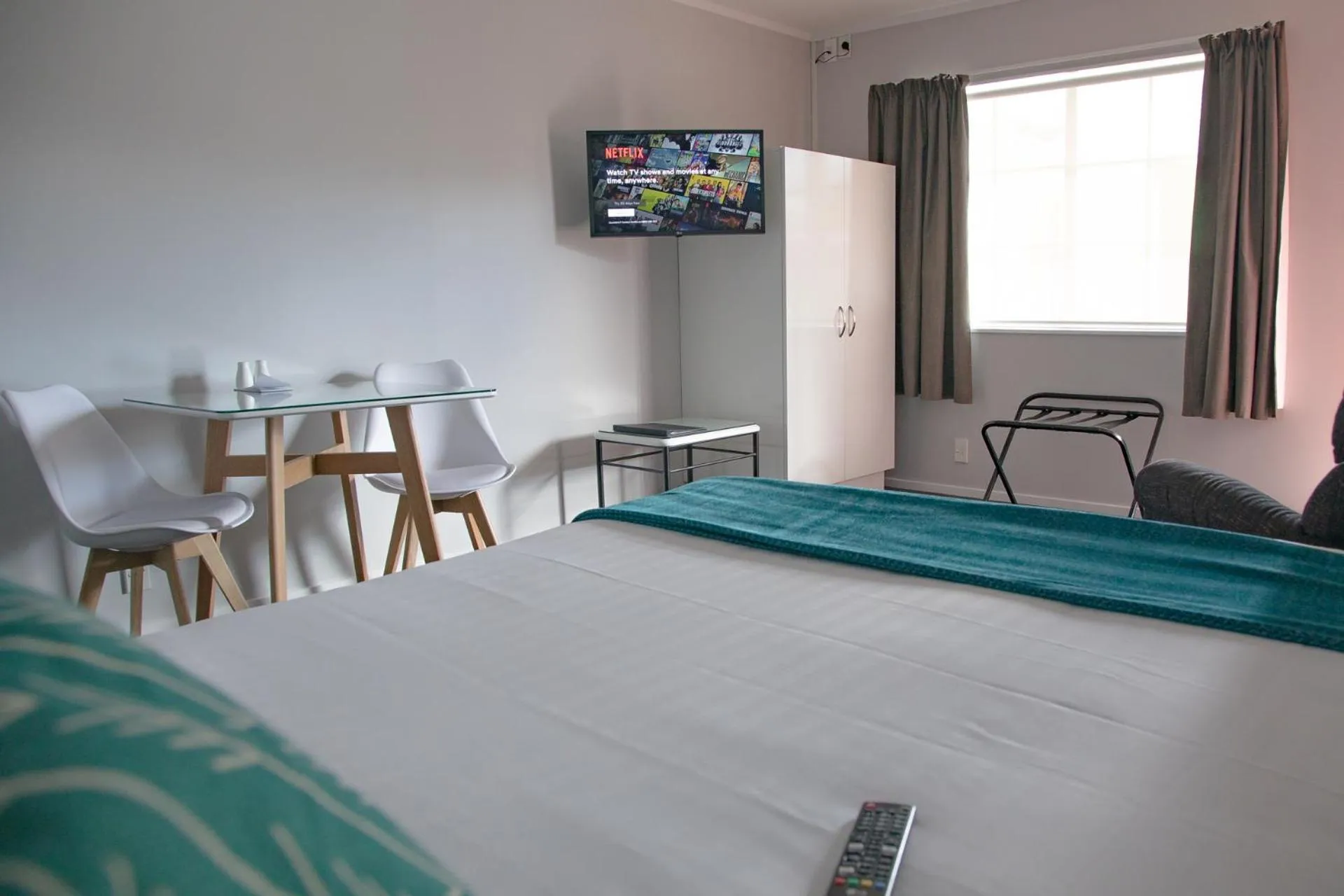 Bed in BKs Palm Court Motor Lodge