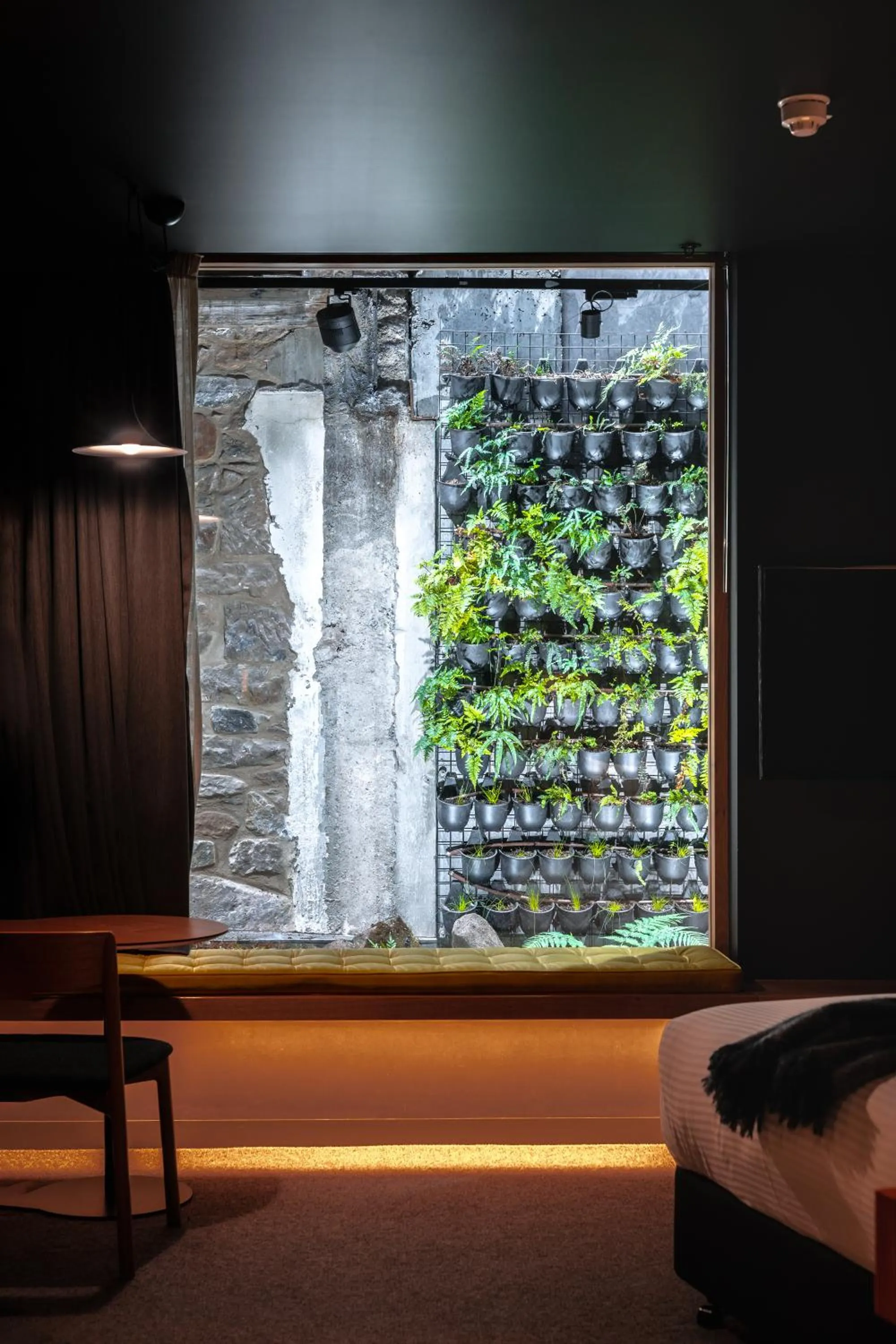 Seating area, Bed in Moss Hotel