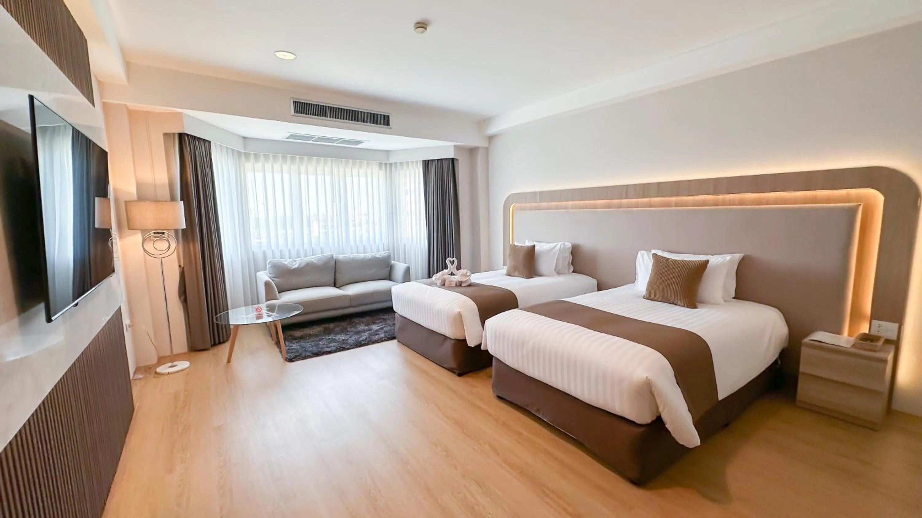 Bed in Siamgrand Hotel