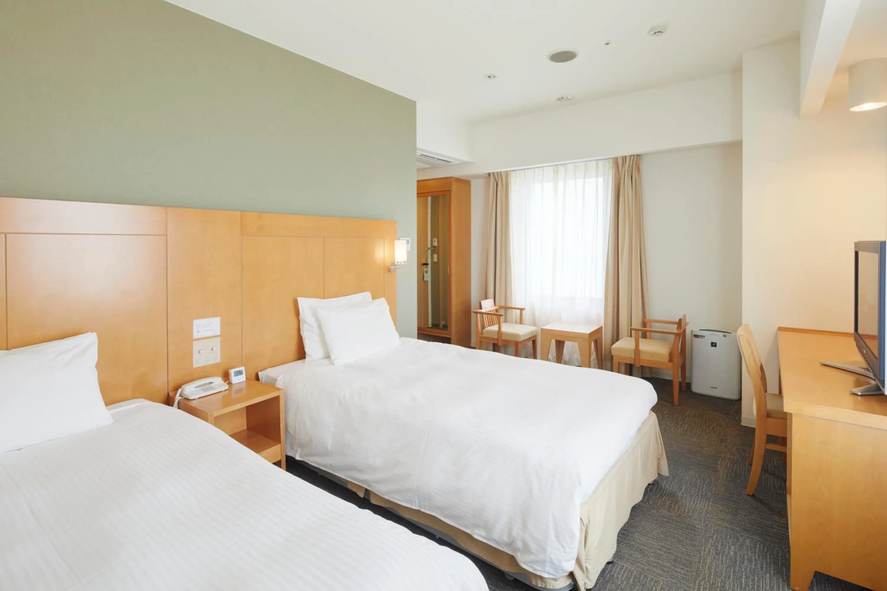 Bed in Hotel Rocore Naha