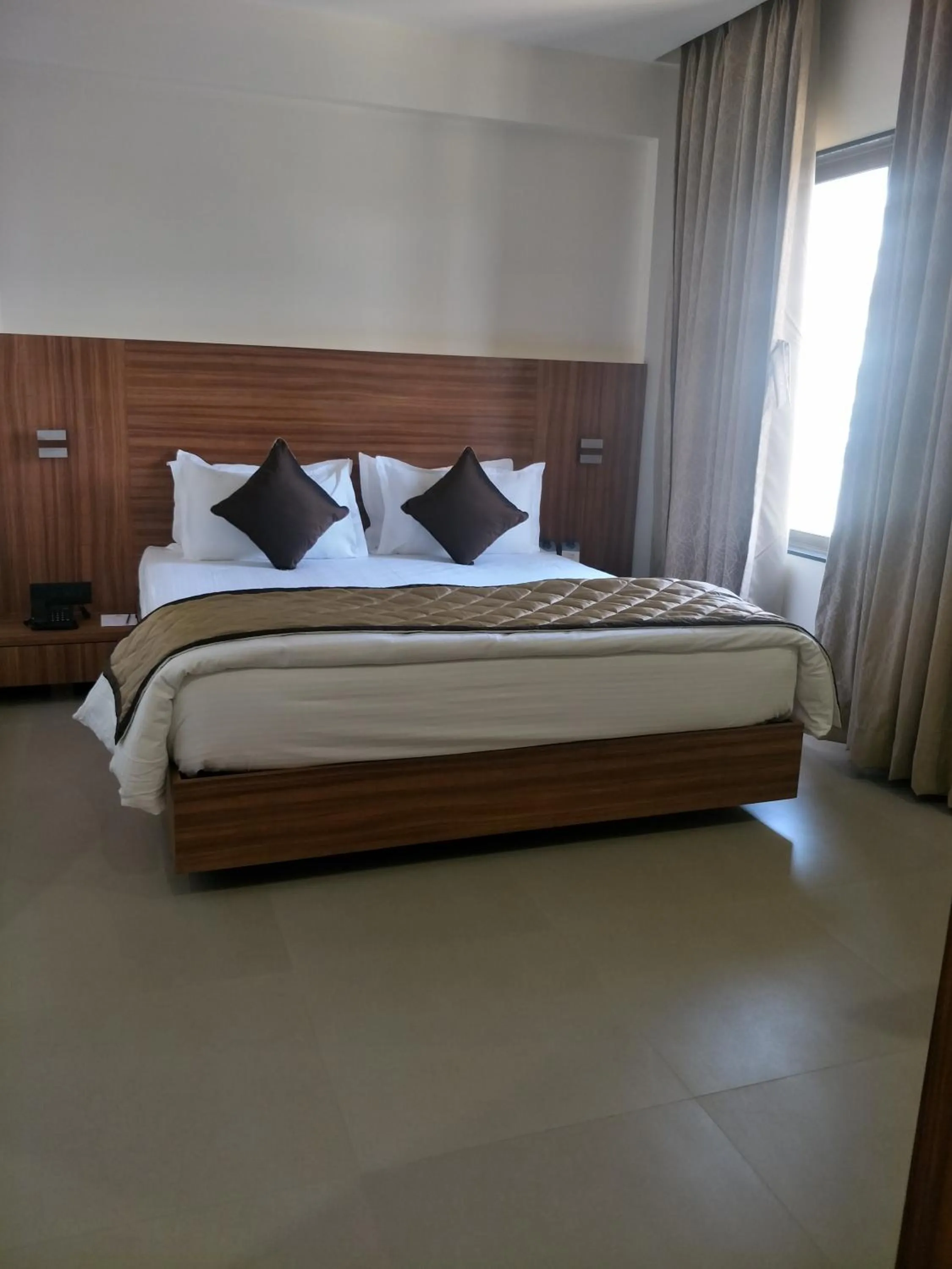 Bed in Kyriad Hotel Solapur by OTHPL