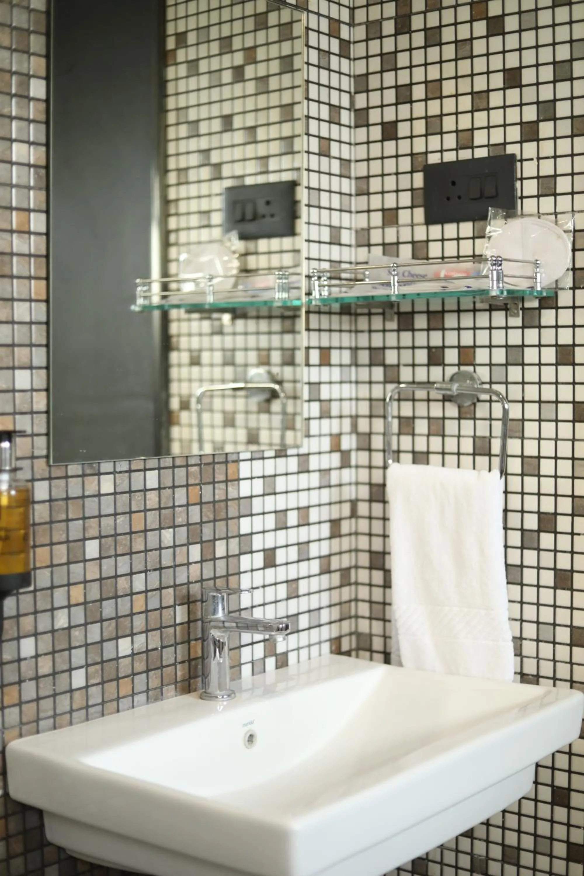 Bathroom in Kyriad Hotel Solapur by OTHPL