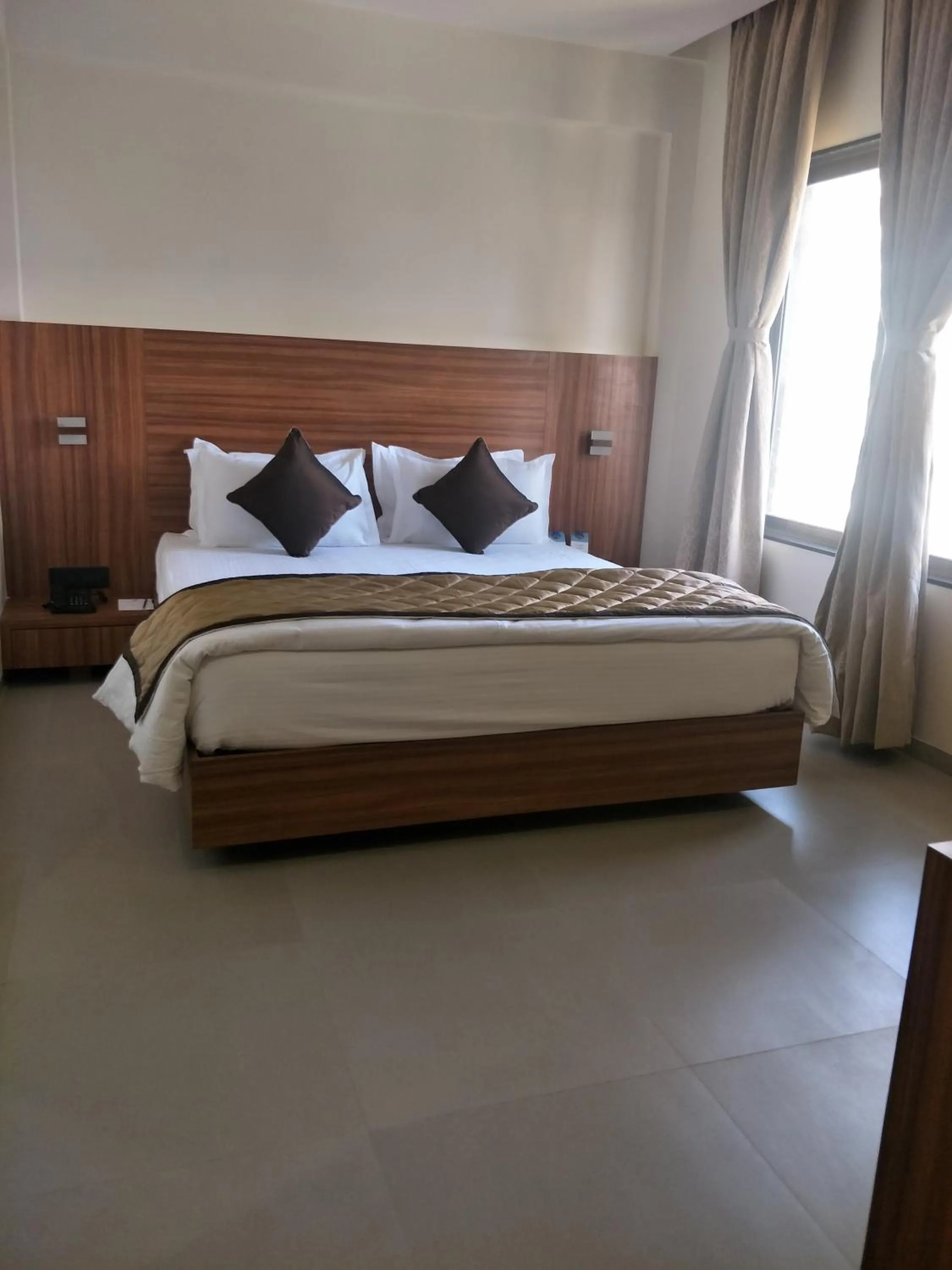 Bed in Kyriad Hotel Solapur by OTHPL