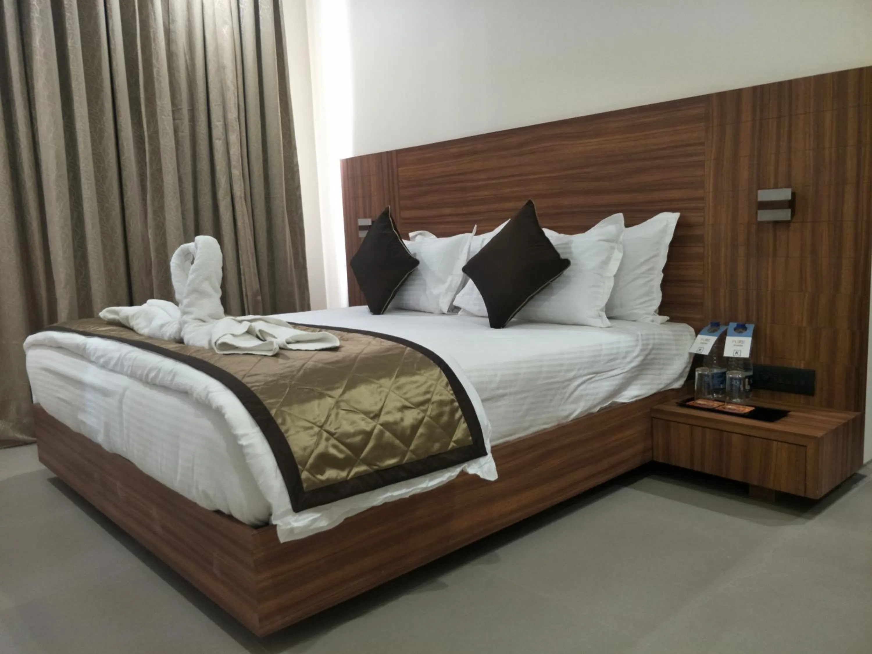 Bed in Kyriad Hotel Solapur by OTHPL