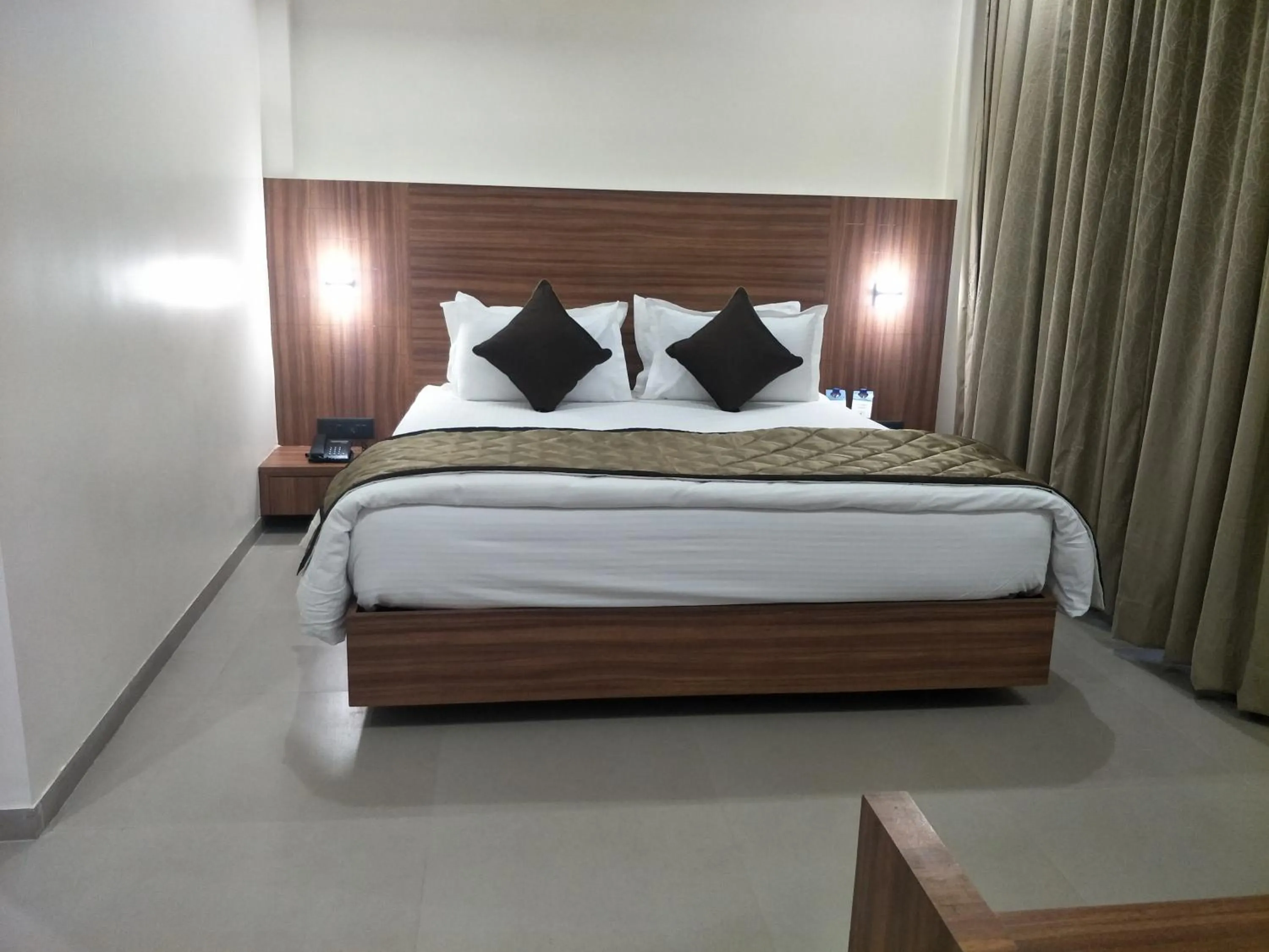 Bed in Kyriad Hotel Solapur by OTHPL