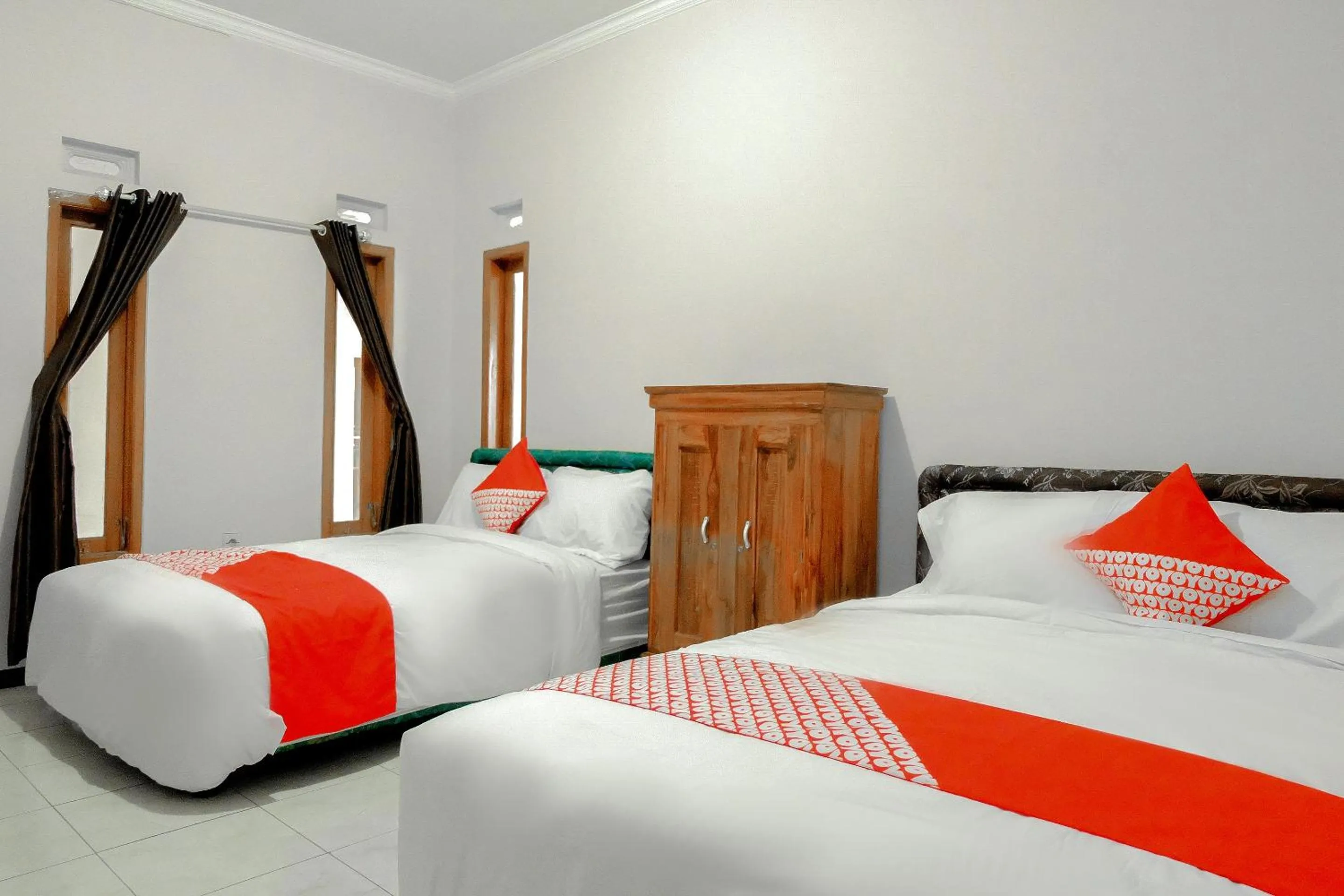 Bedroom in OYO 605 Queen Homestay