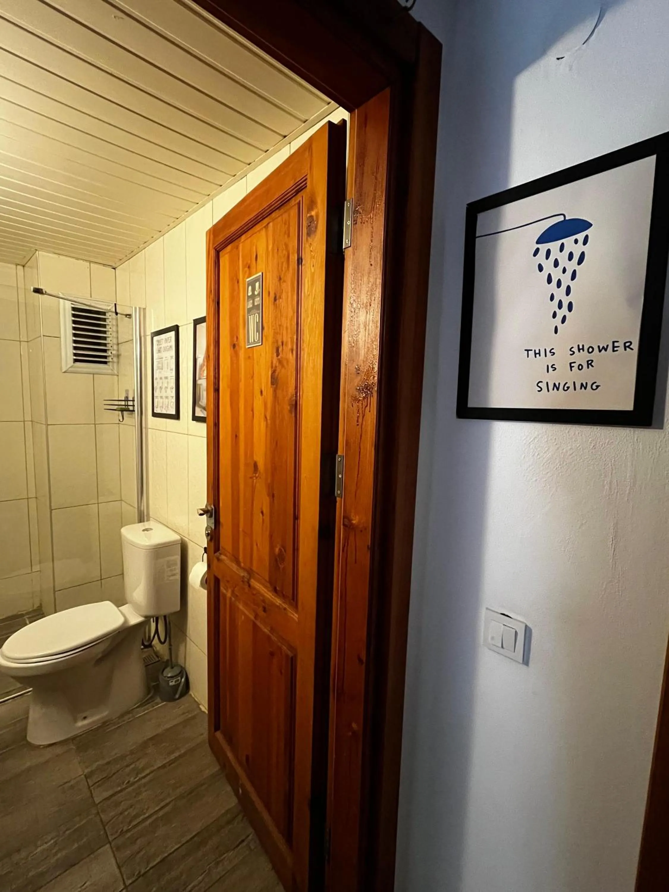 Toilet in Kuyu Beergarden Hostel