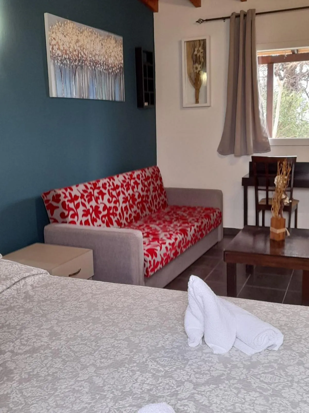 Bed in Victory Apartments Hotel