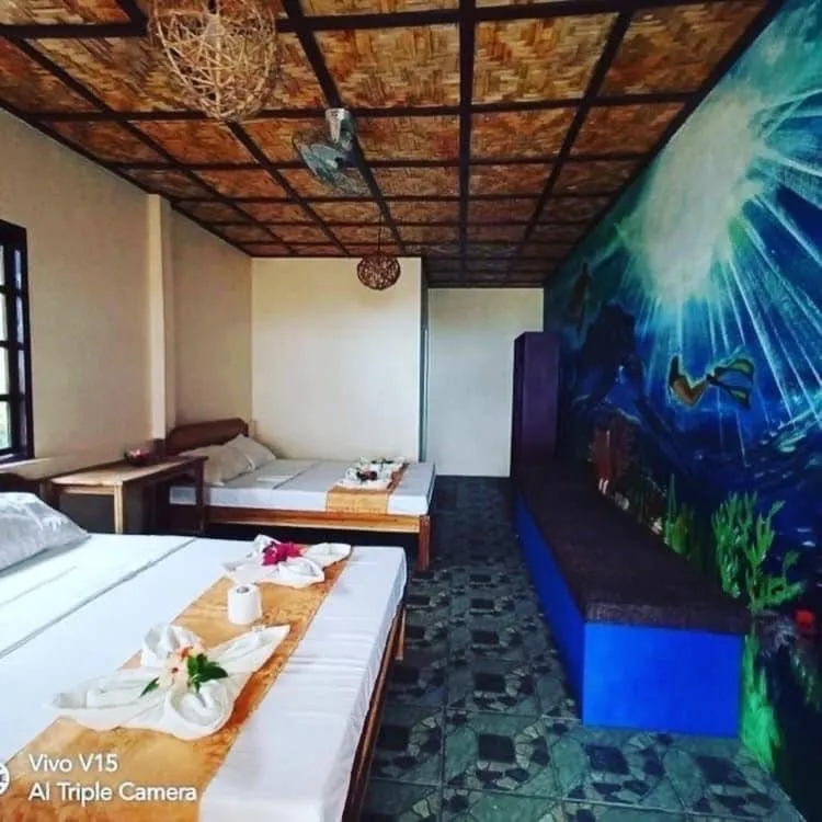 Bed in Mecaja Beach House