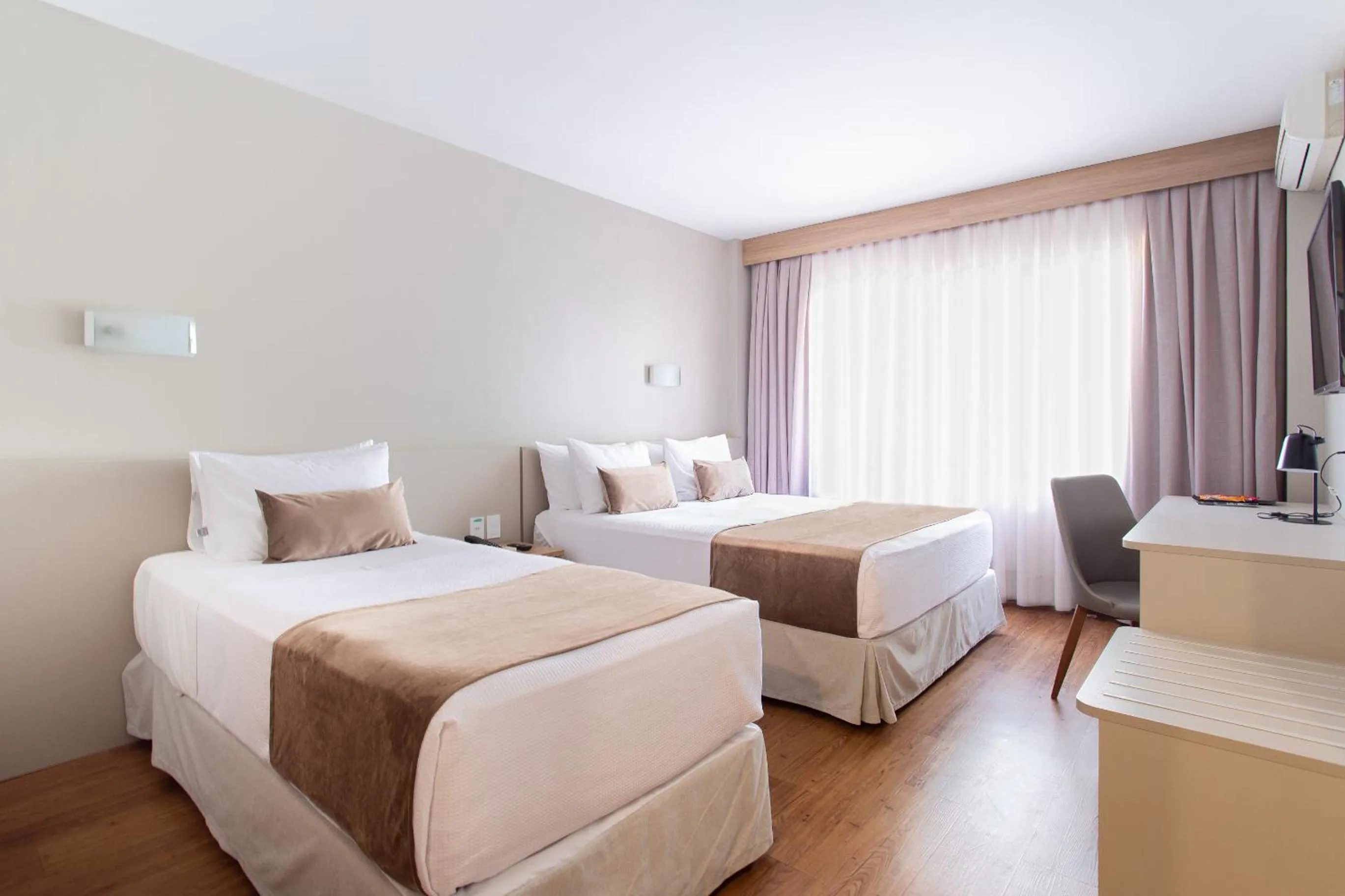 Bed in Jandaia Turismo Hotel