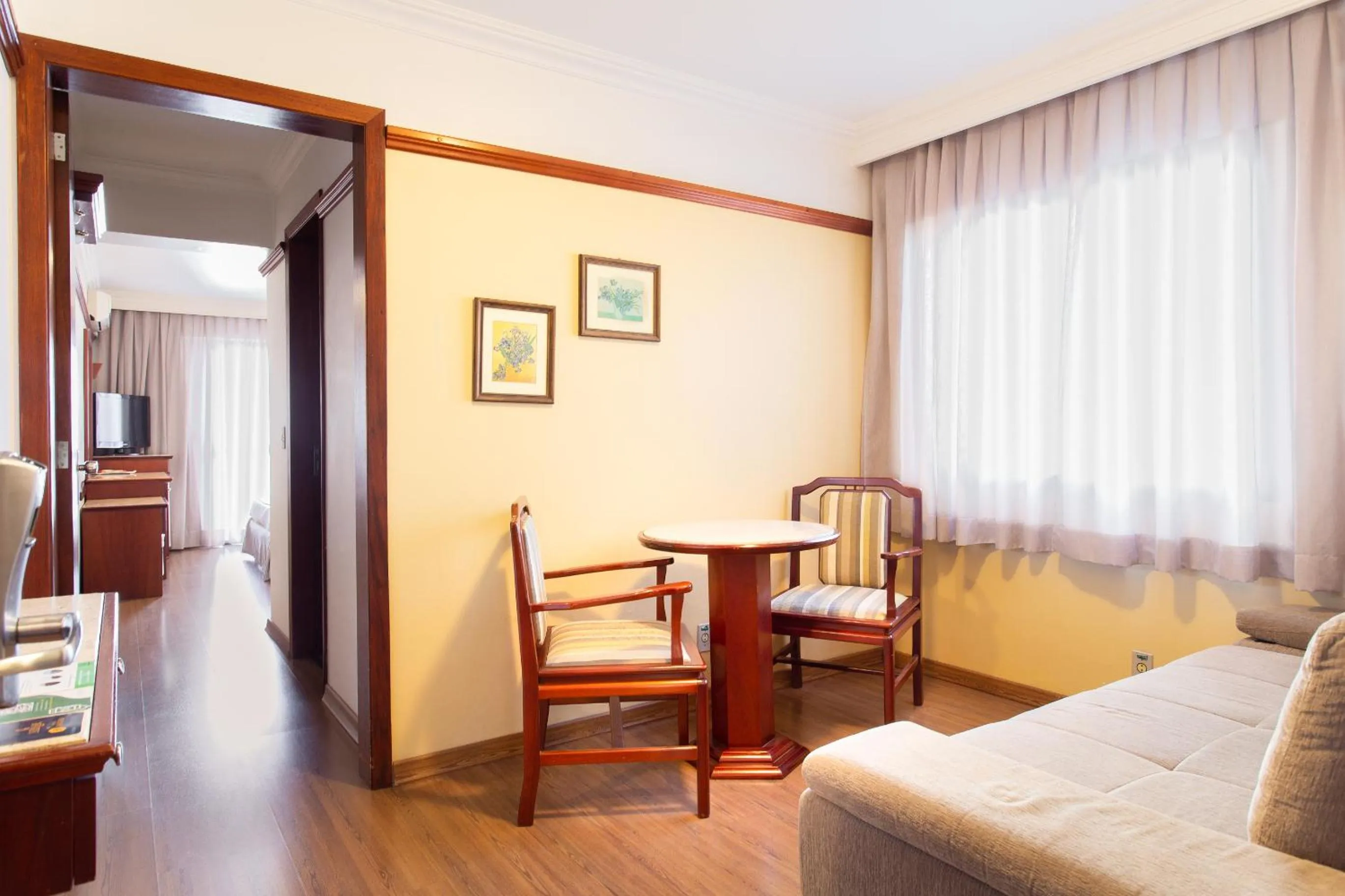 Living room, Bed in Jandaia Turismo Hotel