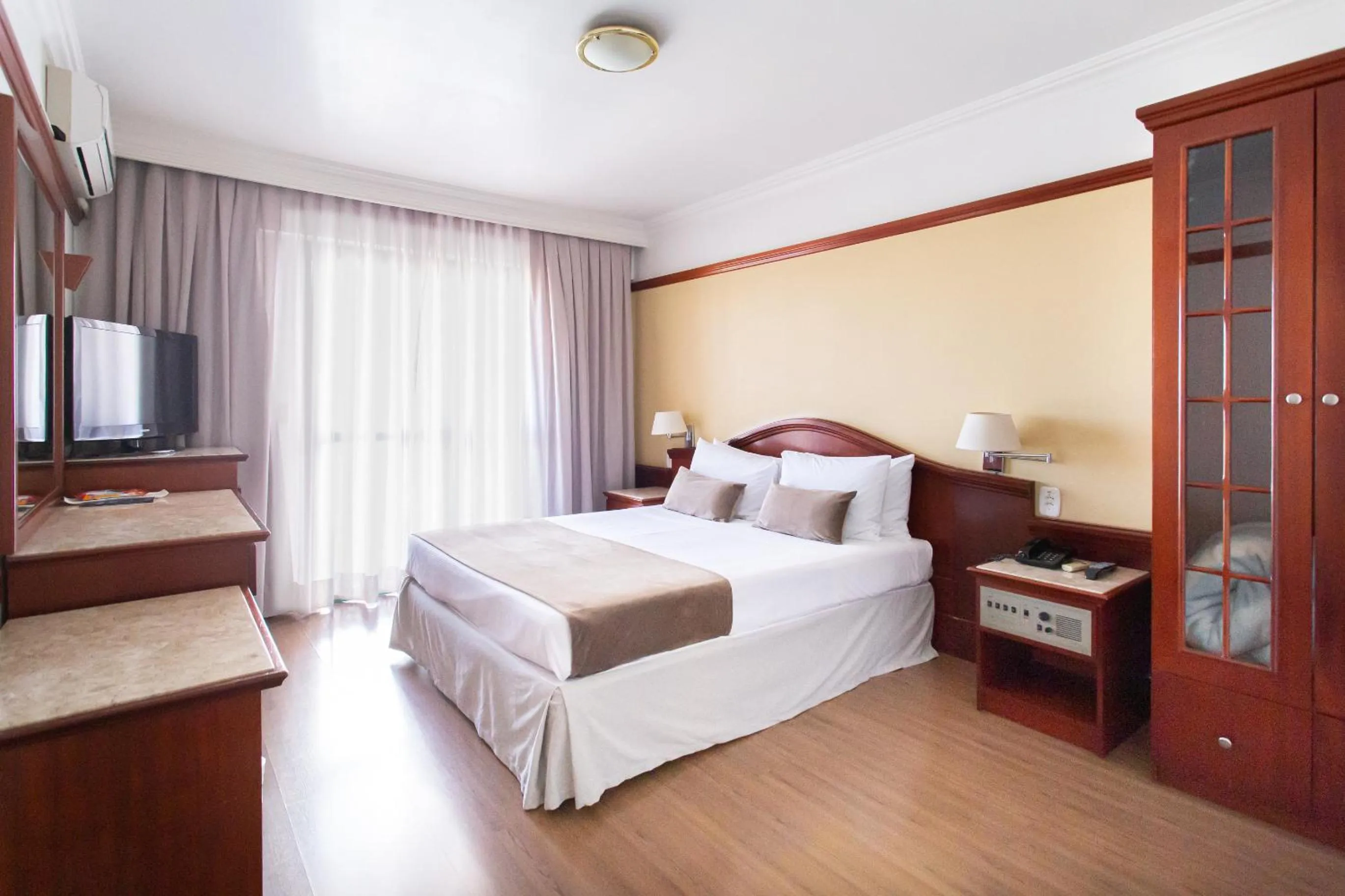 Bed in Jandaia Turismo Hotel