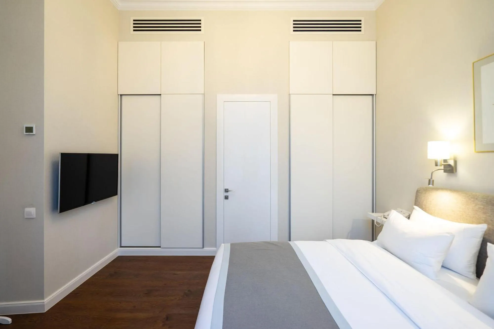 Bed in TIFLIS OPERA Aparthotel