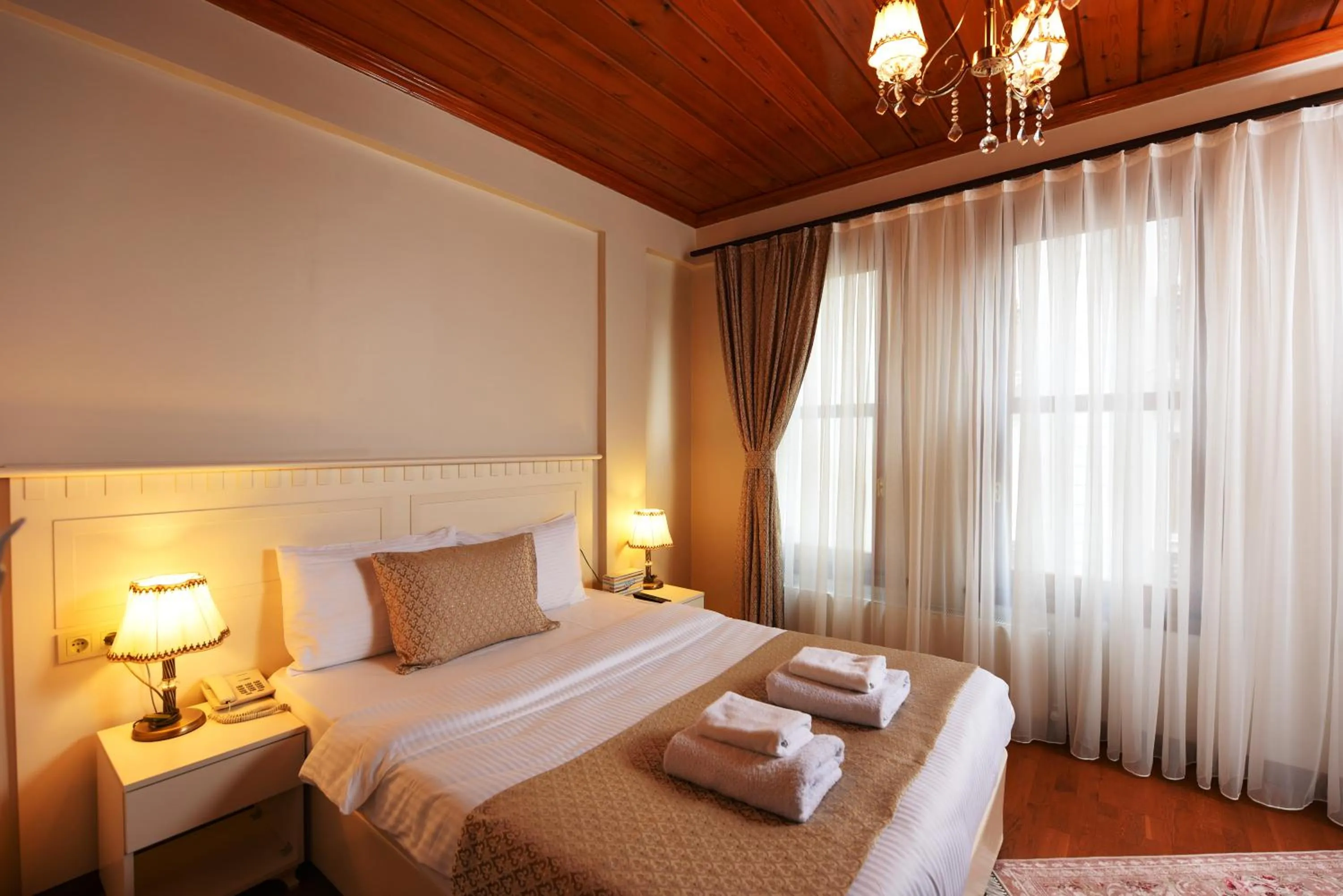 Bedroom, Bed in Elyka Hotel