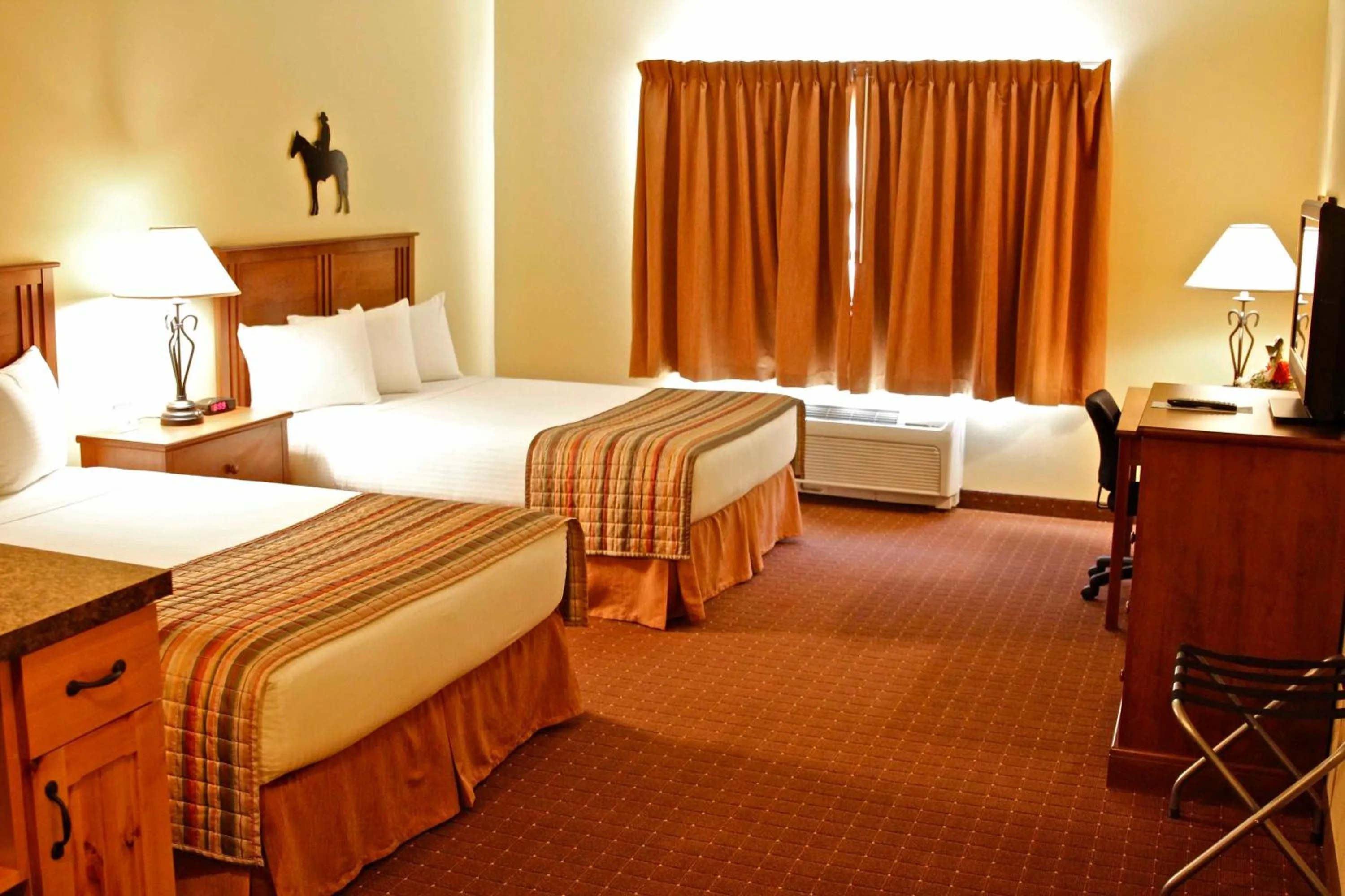 Bed in Arbuckle Lodge Gillette