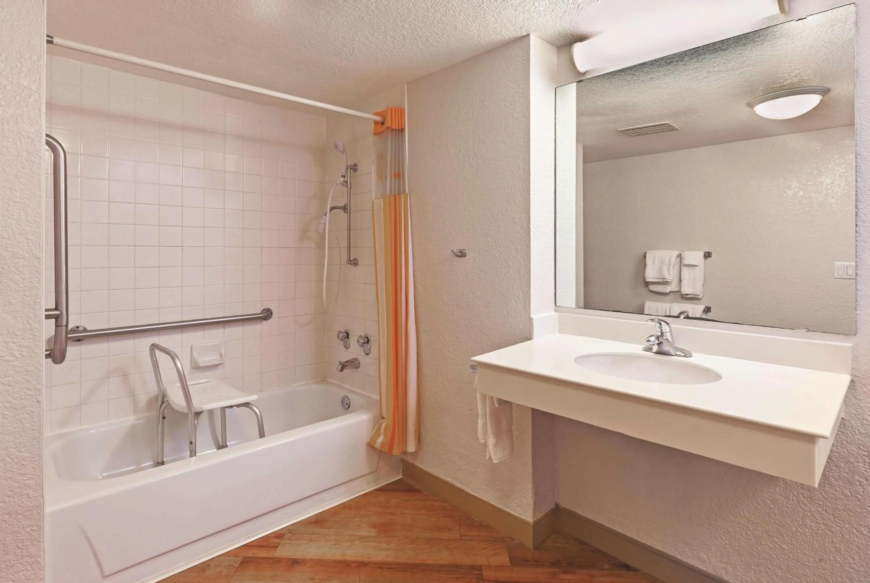 Bathroom in Travelodge by Wyndham Houston Cy-Fair