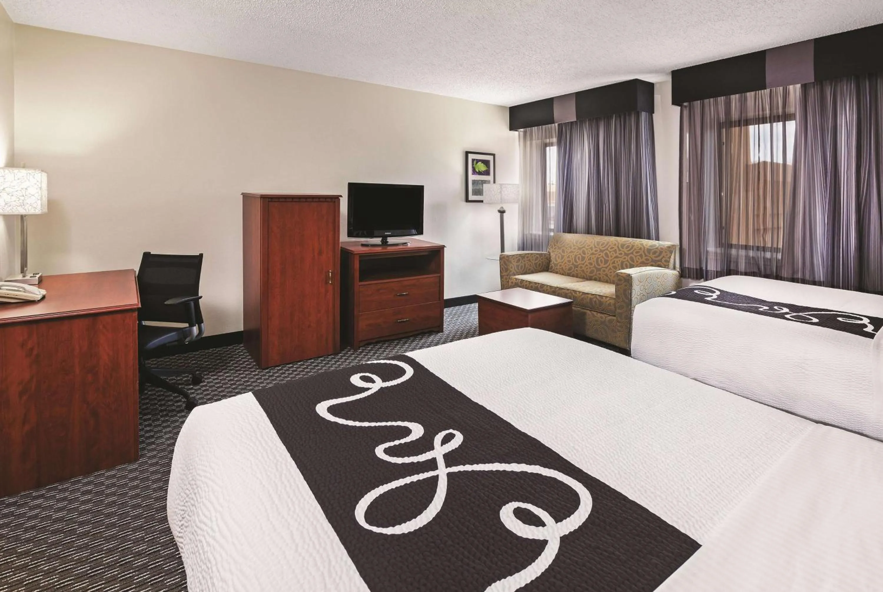 Photo of the whole room, Bed in Travelodge by Wyndham Houston Cy-Fair