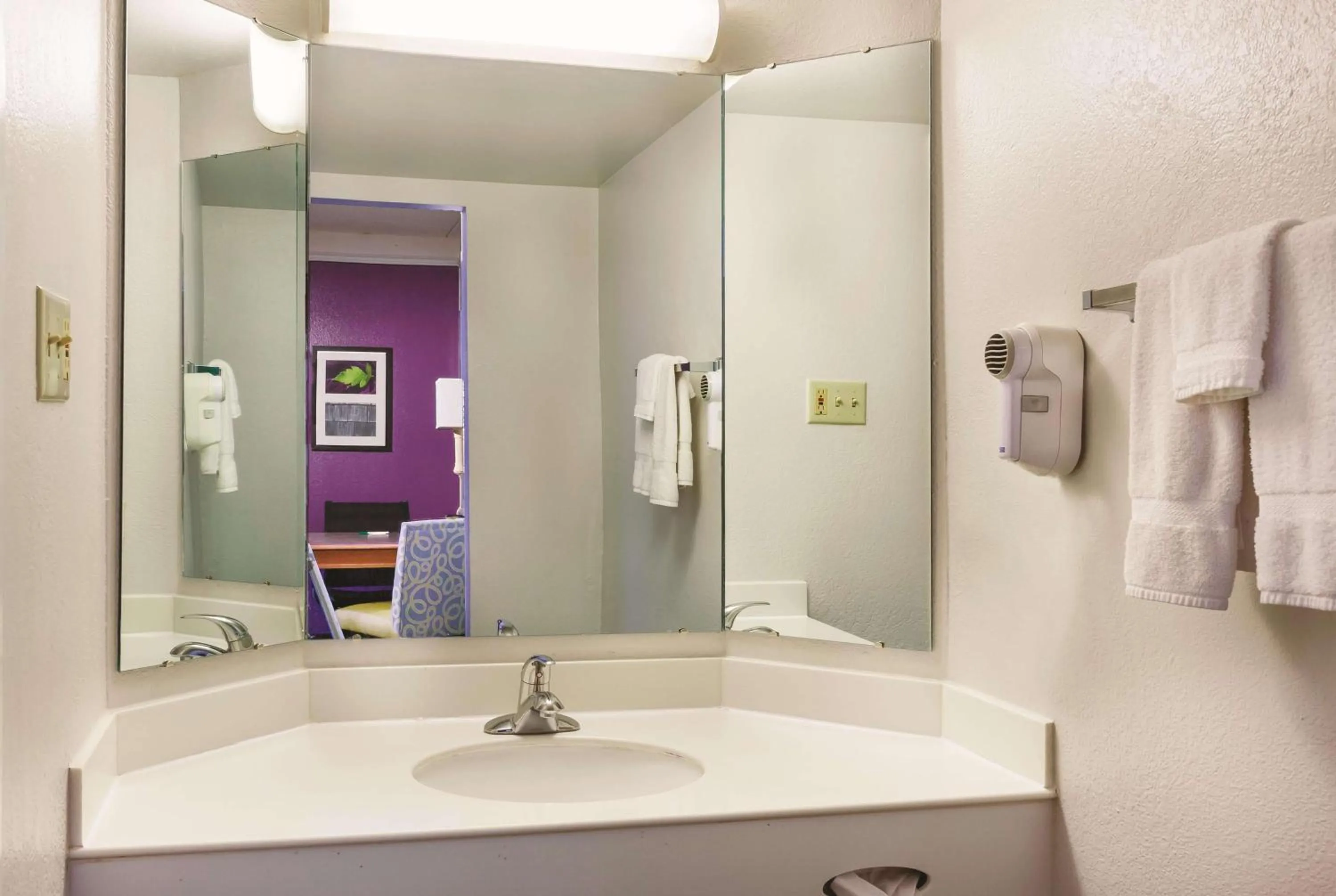 Bathroom in Travelodge by Wyndham Houston Cy-Fair