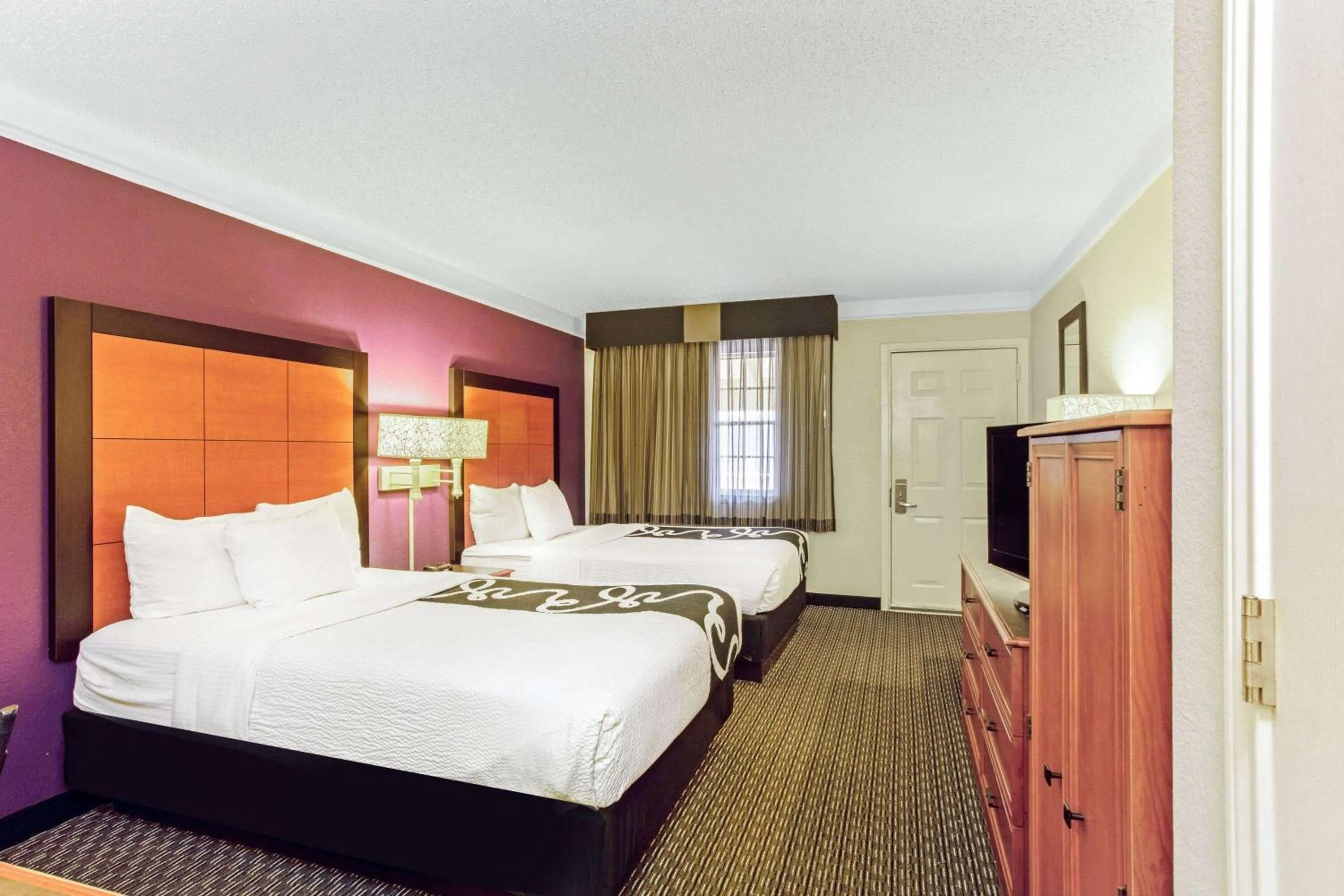 Photo of the whole room, Bed in La Quinta Inn by Wyndham and Conference Center San Angelo