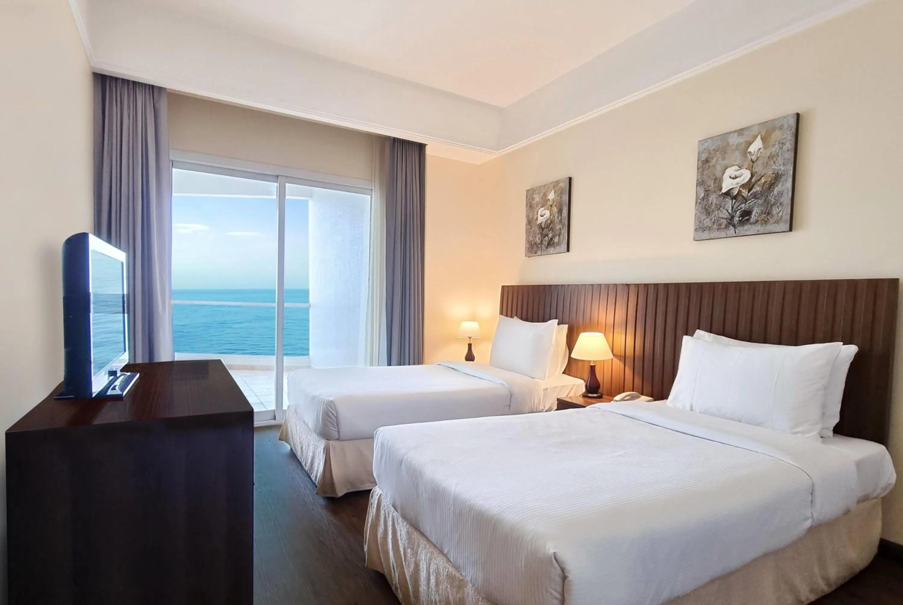 Photo of the whole room, Bed in Ramada by Wyndham Beach Hotel Ajman