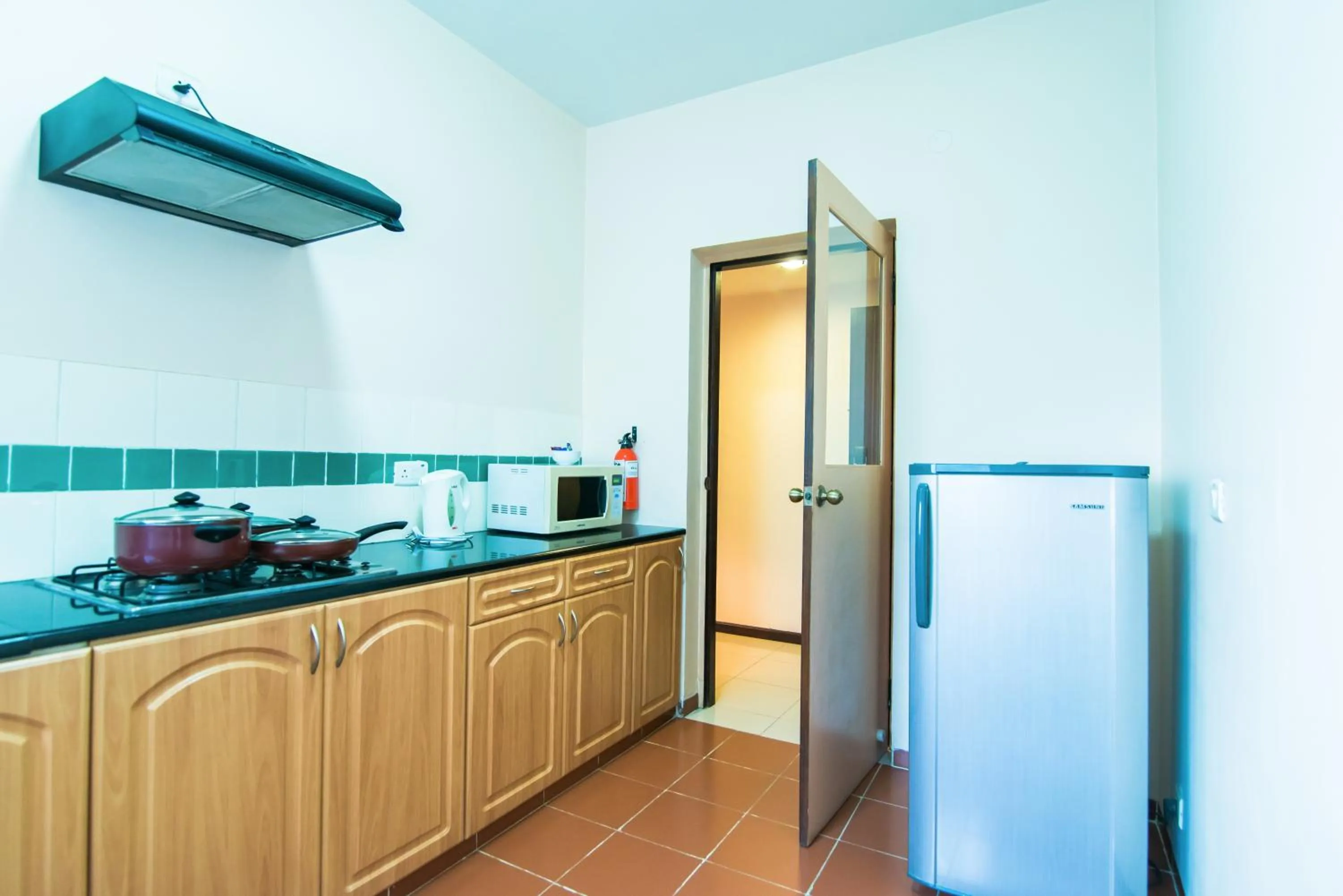 Kitchen or kitchenette in Halcyon Hotel Residences Koramangala - Bangalore