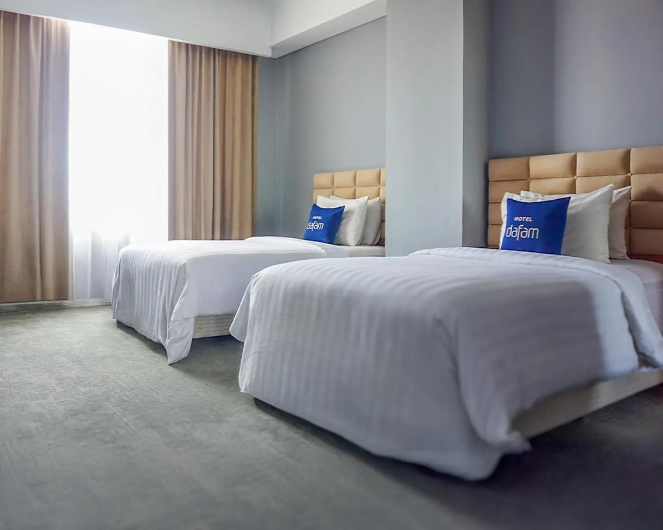 Bed in Hotel Dafam Pekanbaru