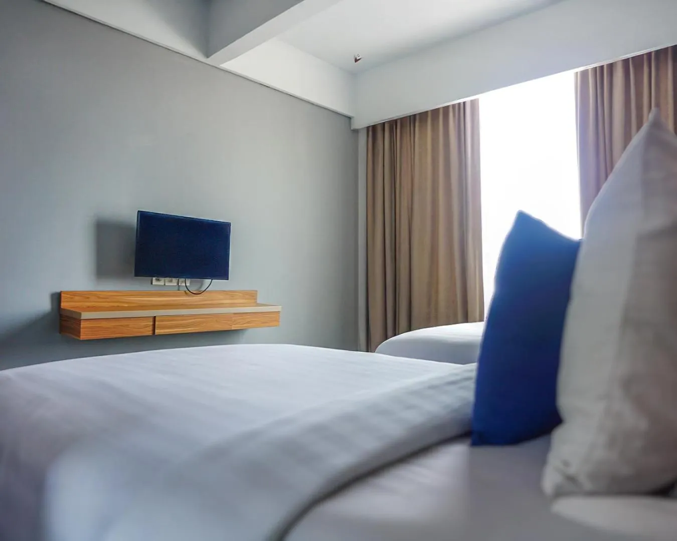 Bed in Hotel Dafam Pekanbaru