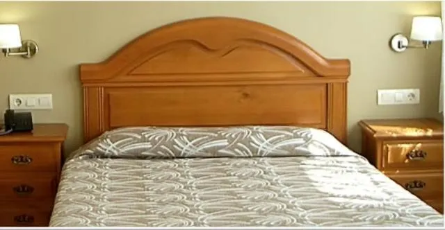 Bed in Hotel Bruselas