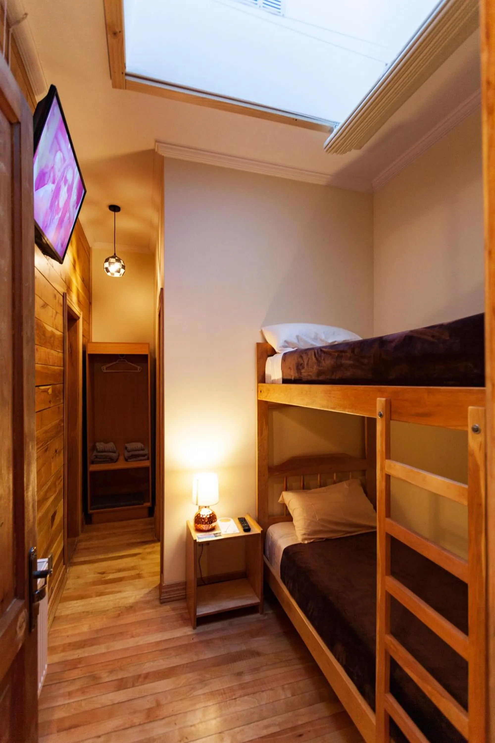 Photo of the whole room, Bed in Hostal Boutique Patagonia Mística