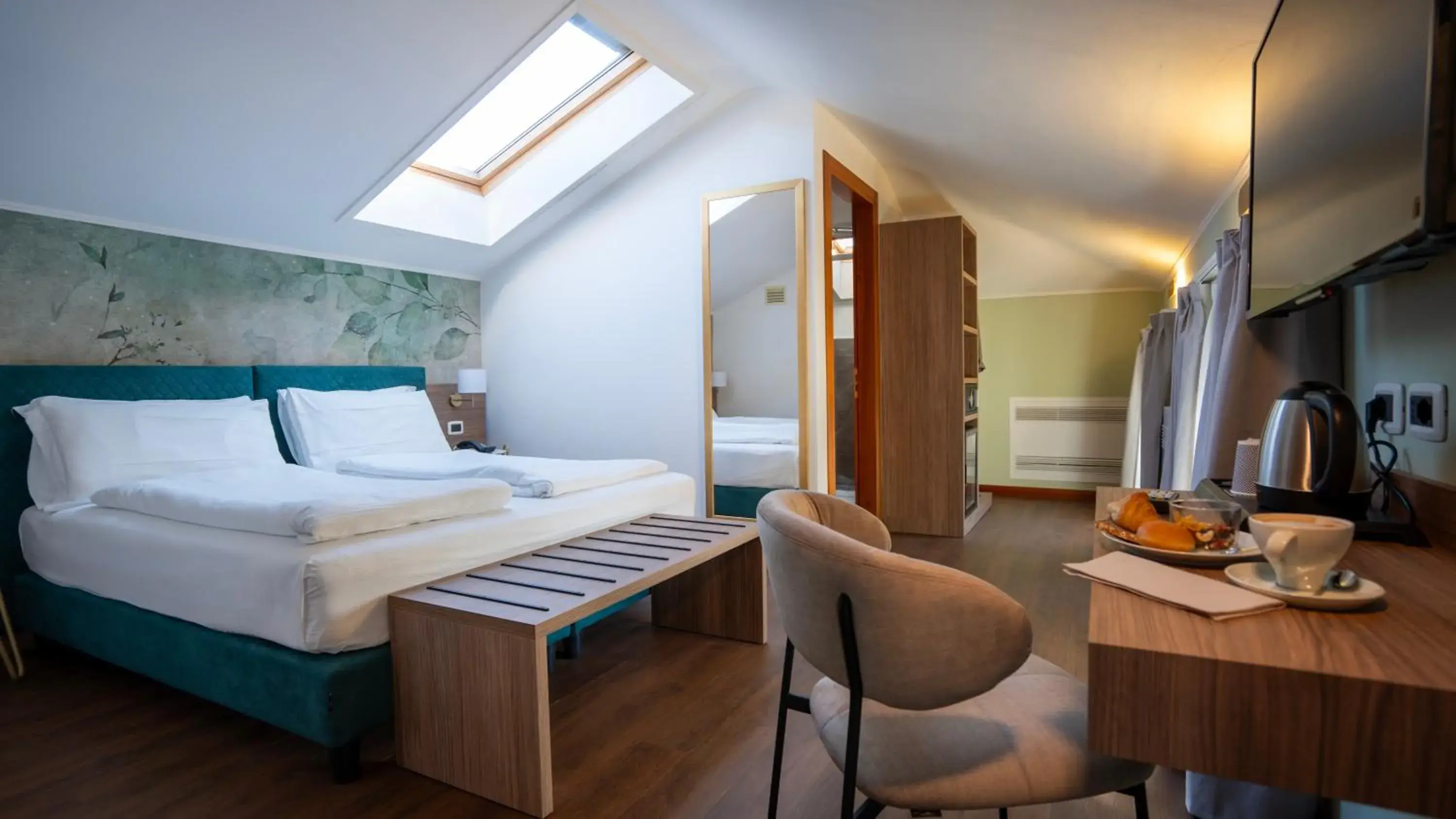 Double Attic with Partial Lake View in Gardone Palace Hotel Double Attic with Partial Lake View in Gardone Palace Hotel