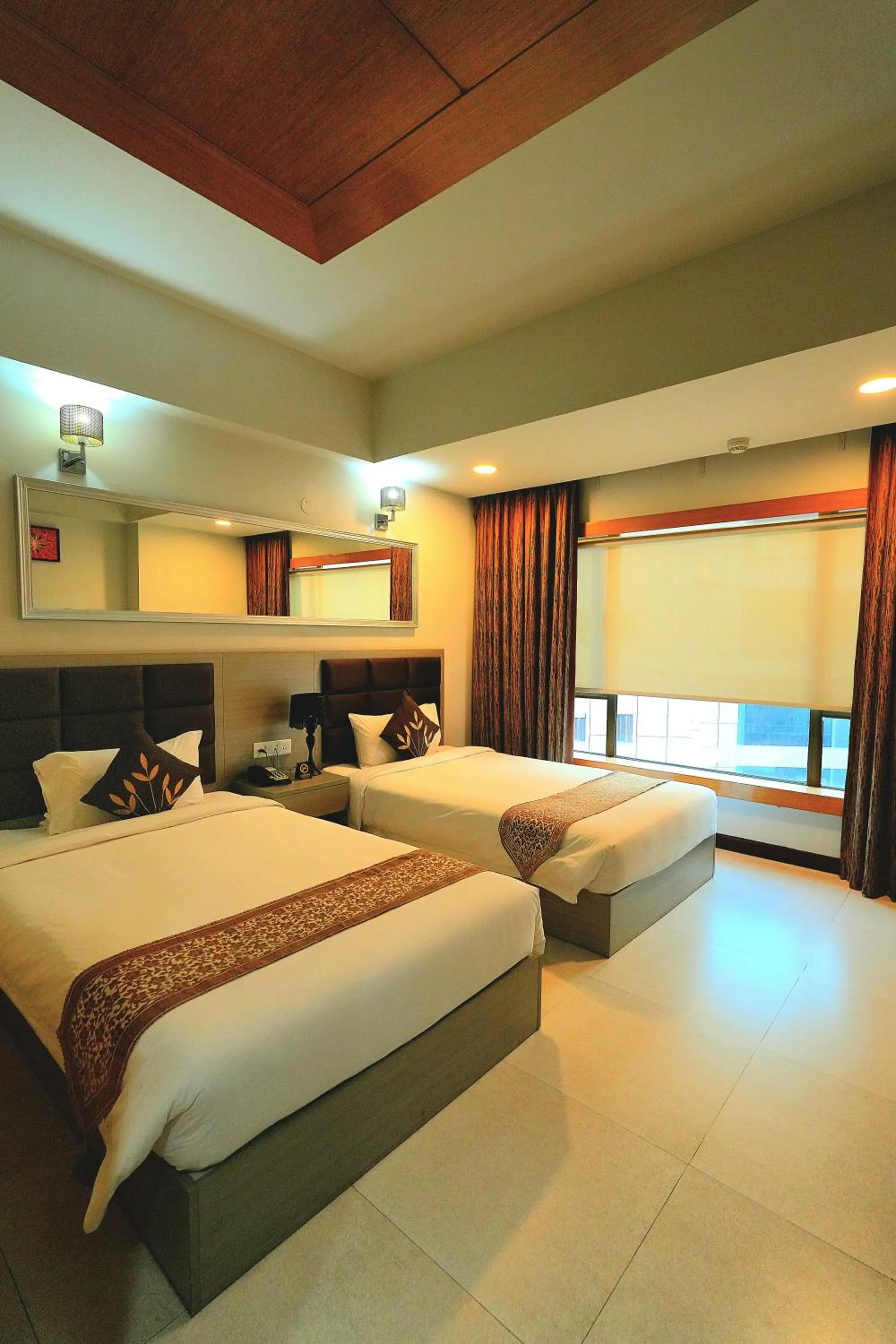Bed in Aristocrat Hotel, New Town, Kolkata
