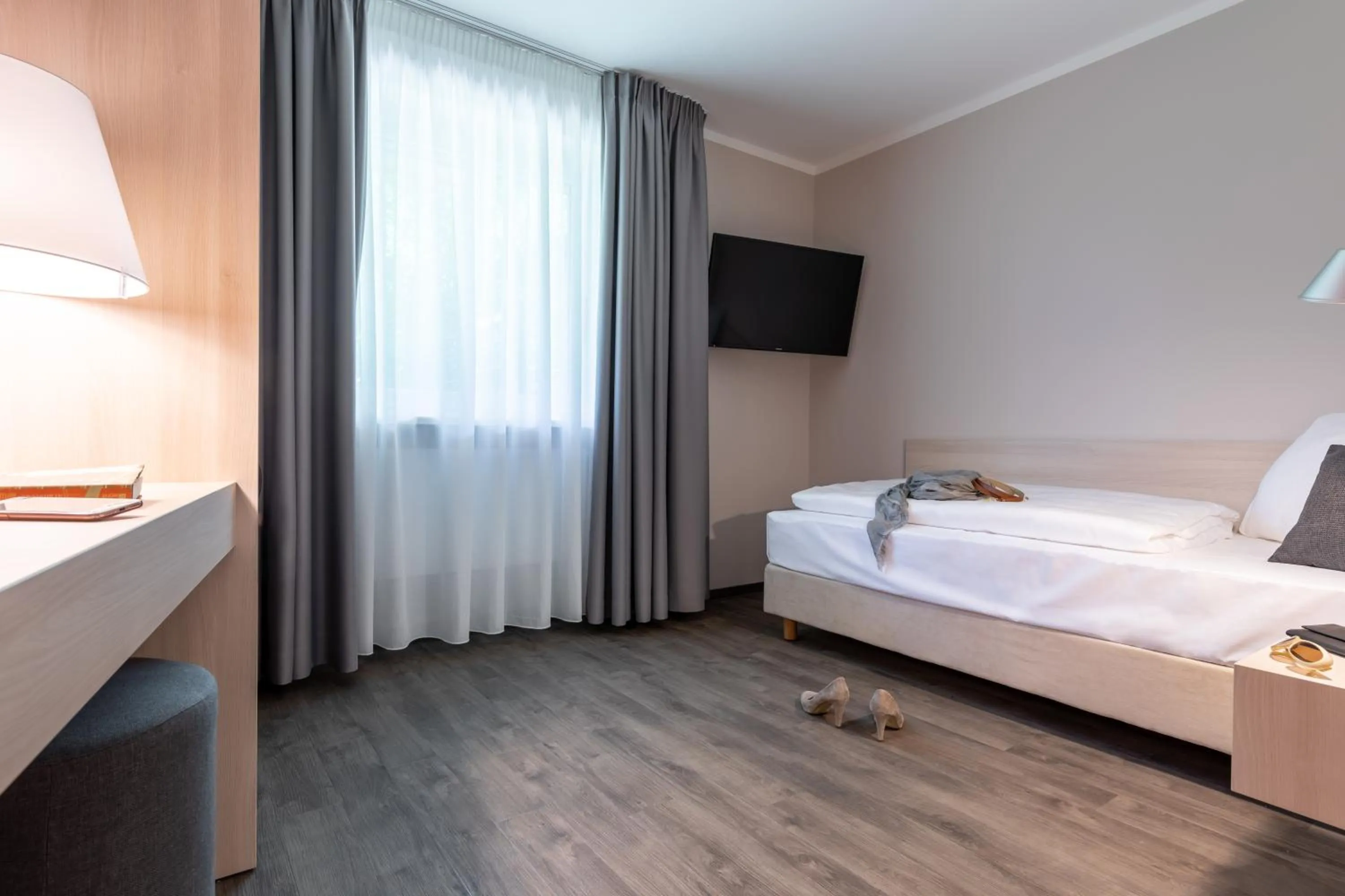 Photo of the whole room, Bed in Serways Hotel Waldmohr