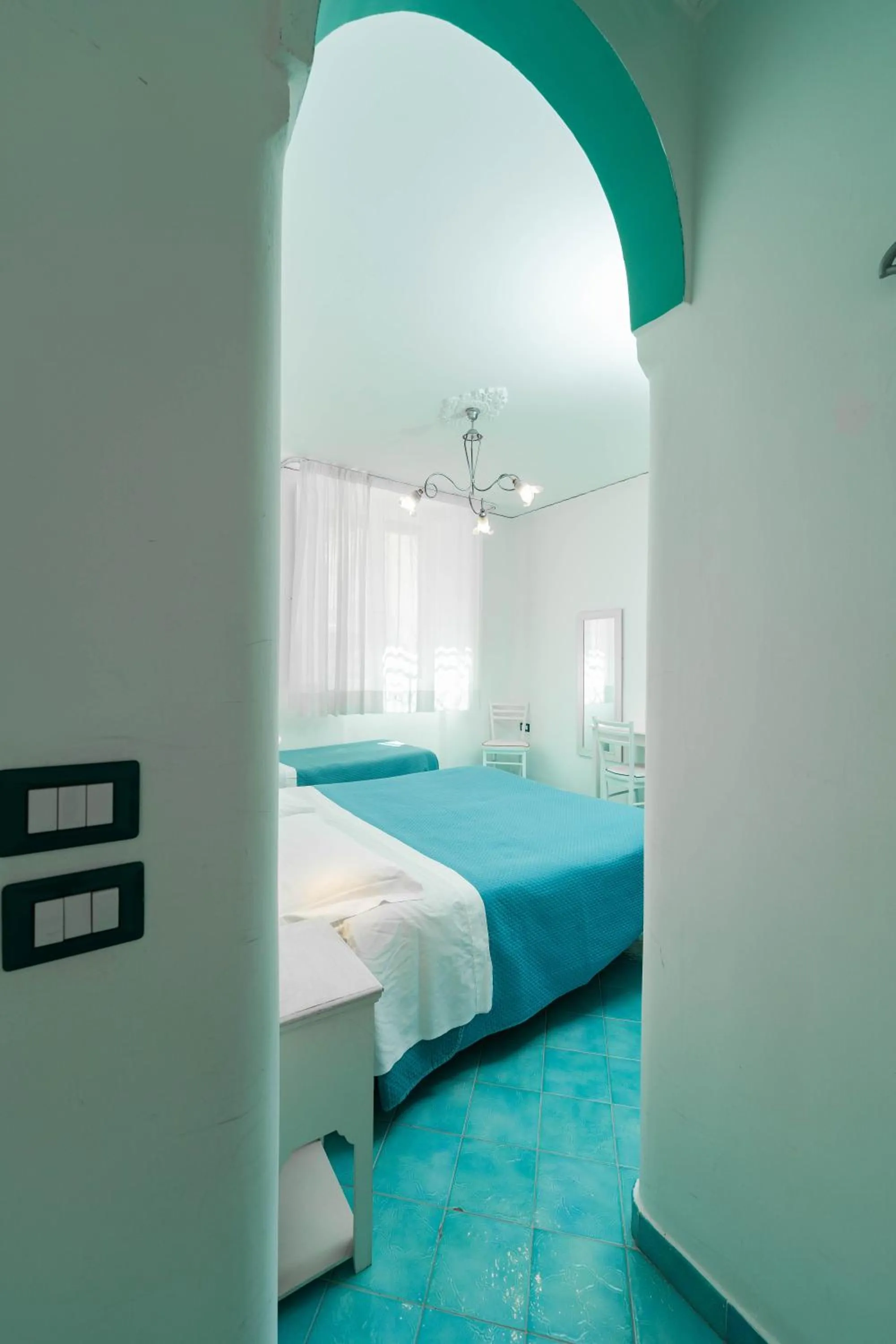 Photo of the whole room, Bed in Albergo S. Andrea