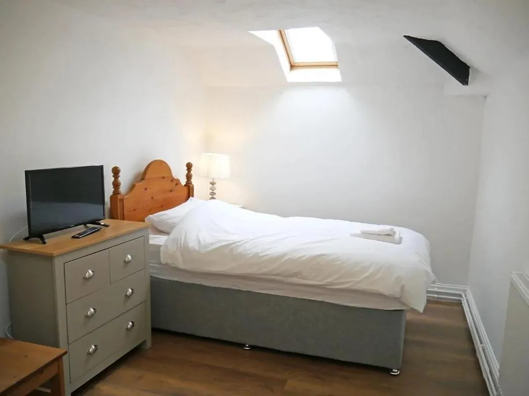 Bed in Glendower Guest Apartments