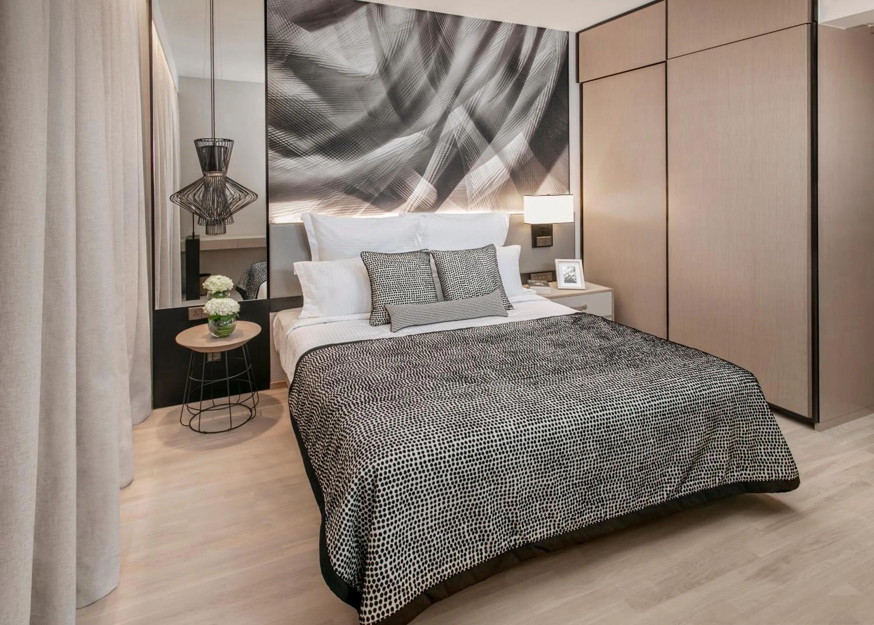 Photo of the whole room, Bed in Ascott Orchard Singapore