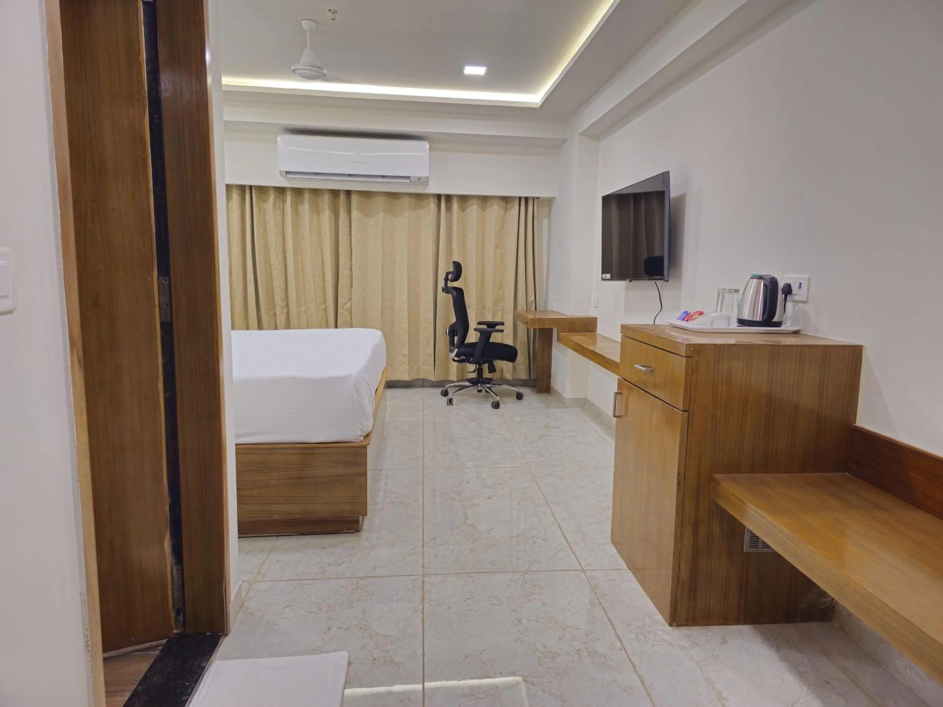 Bedroom in Ginger Ahmedabad SG Road