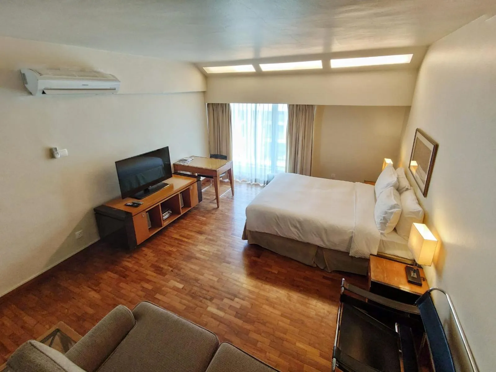 Living room, Bed in Orchard Point Serviced Apartments