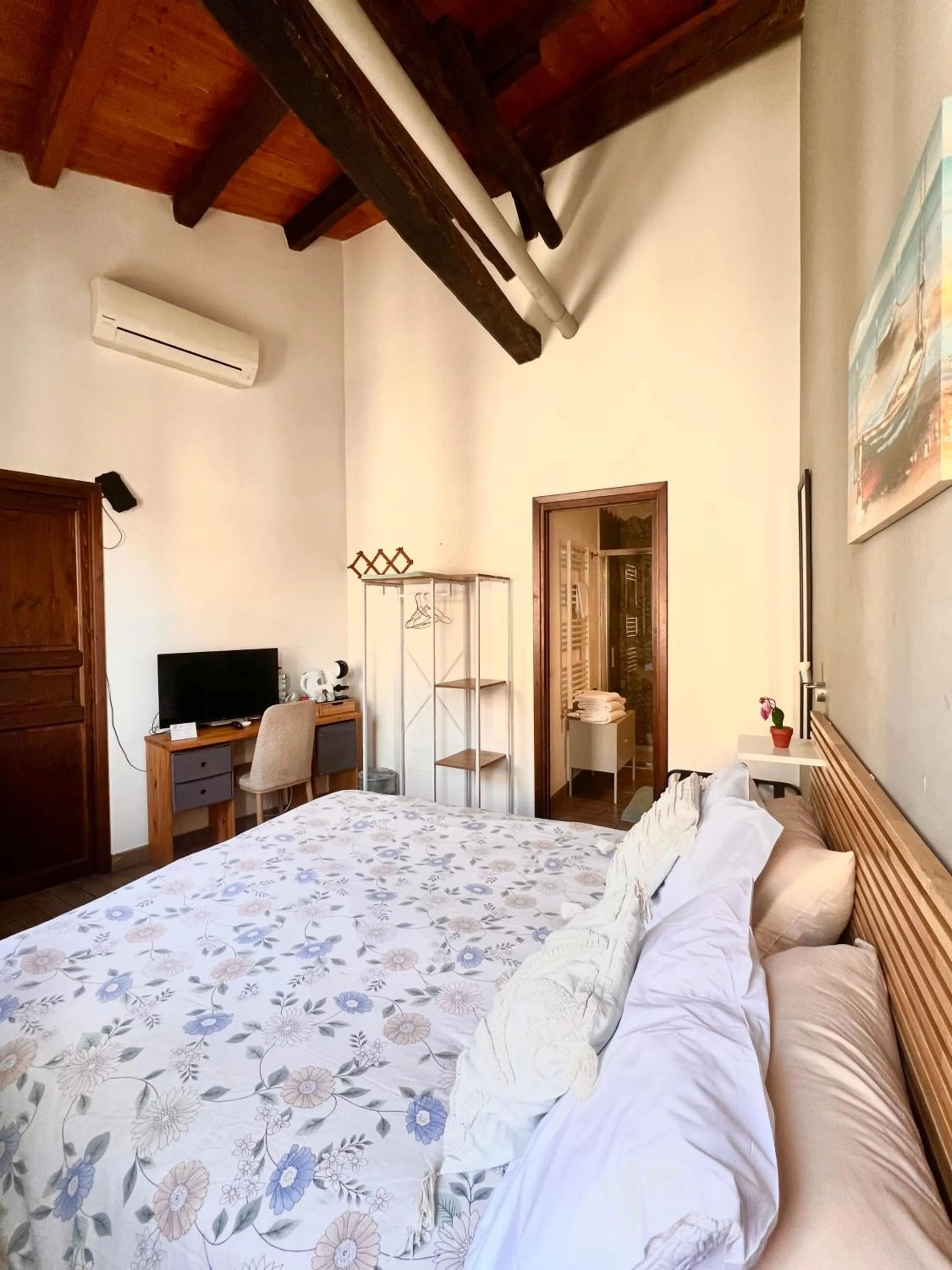 Bed in Kasa Kala Rooms & Apartments