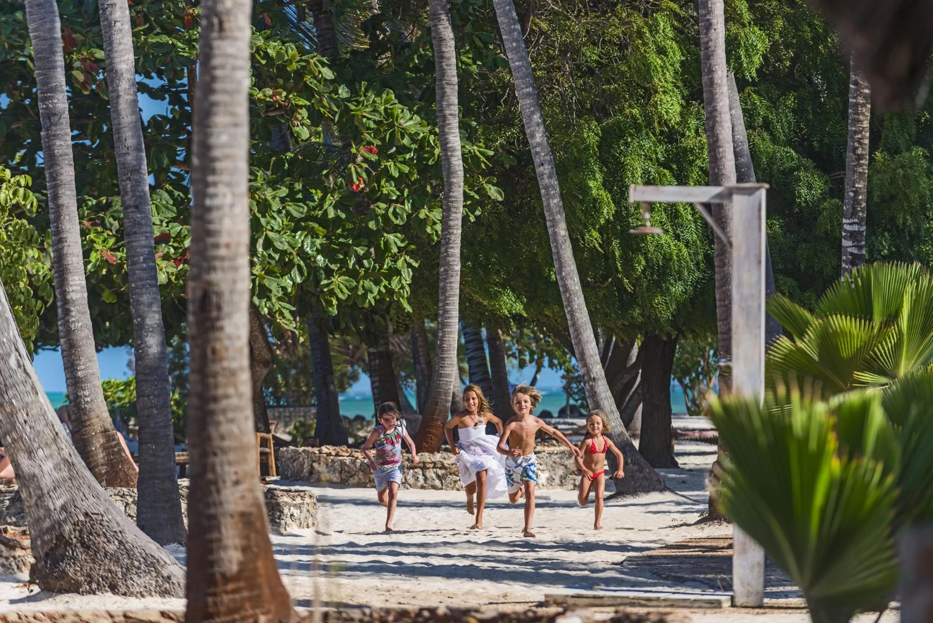 People in Diamonds Mapenzi Beach