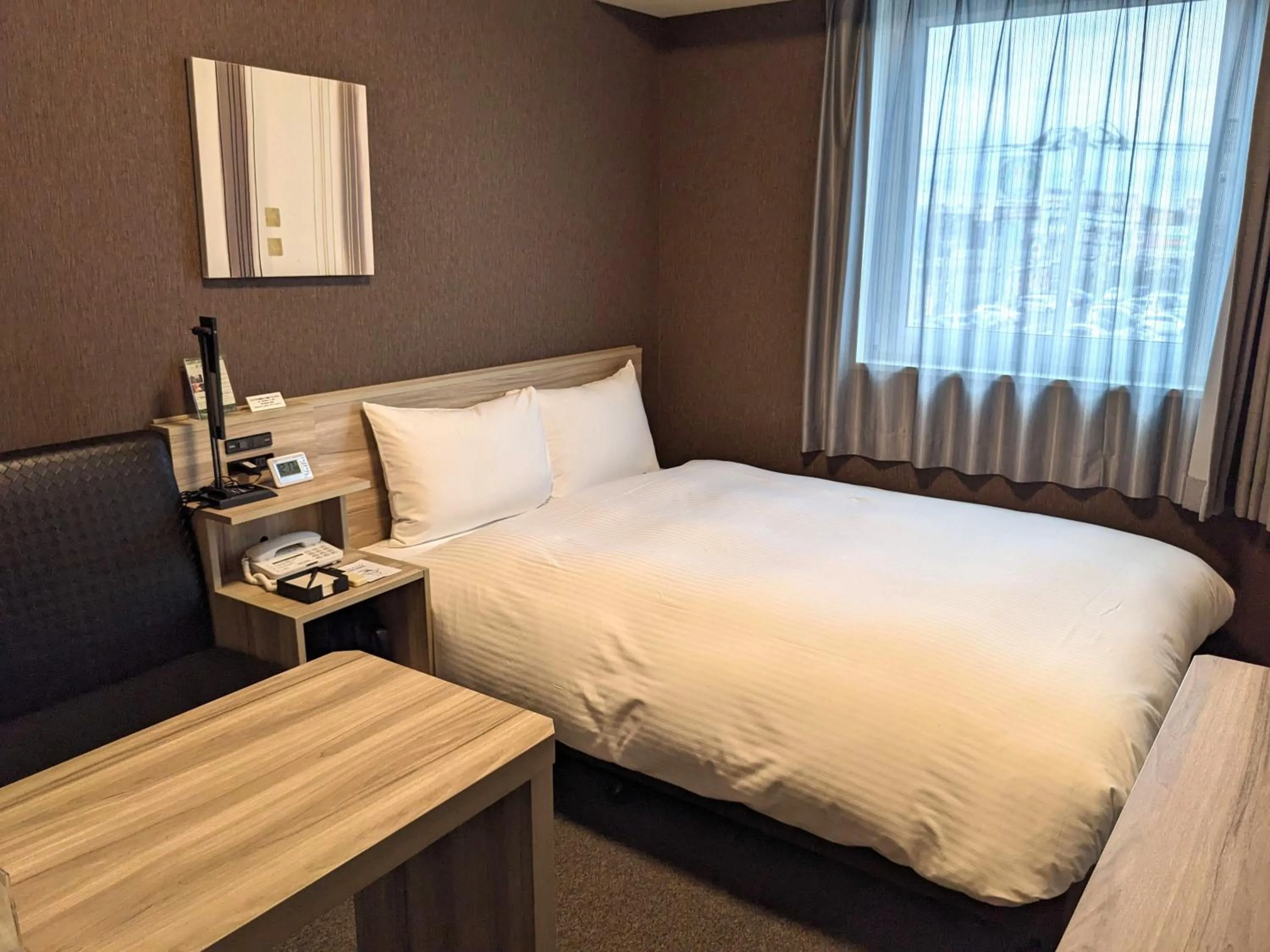 Photo of the whole room, Bed in Hotel Route-Inn Chiba Hamano -Tokyowangando-