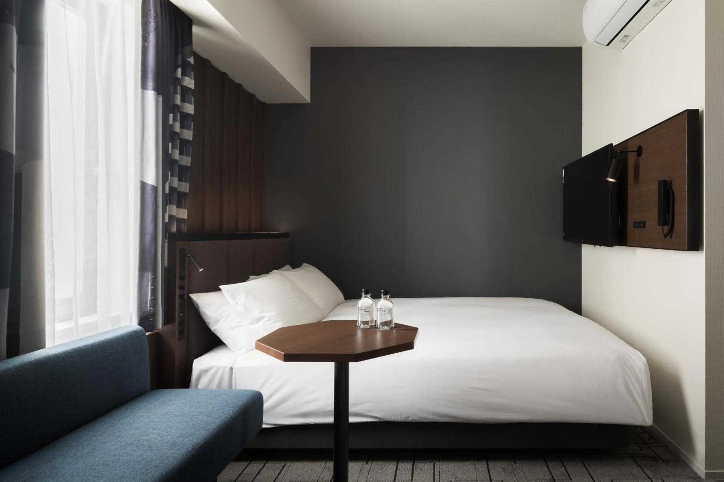 Photo of the whole room, Bed in Bespoke Hotel Shinsaibashi