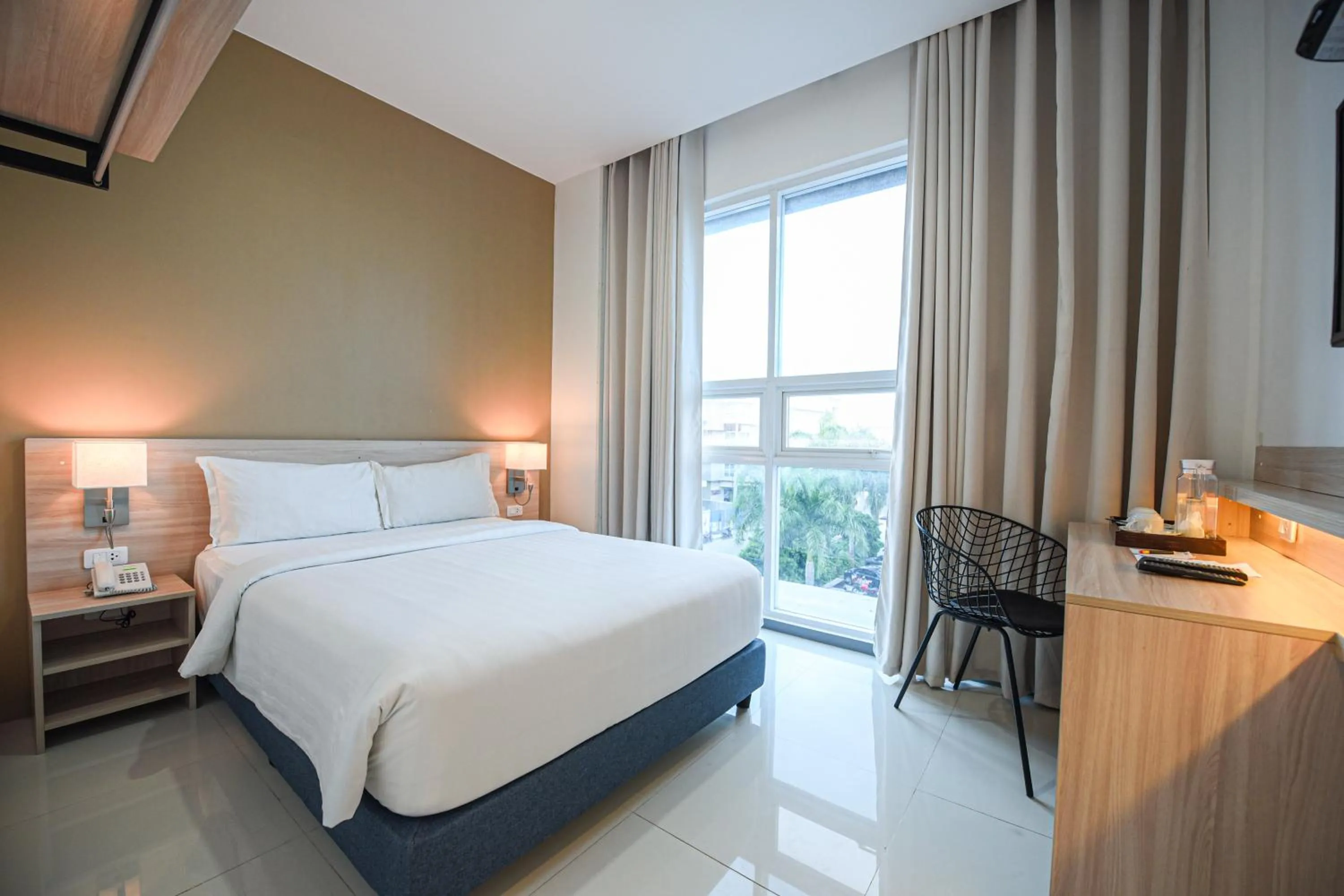 Bedroom in Figtree Hotel