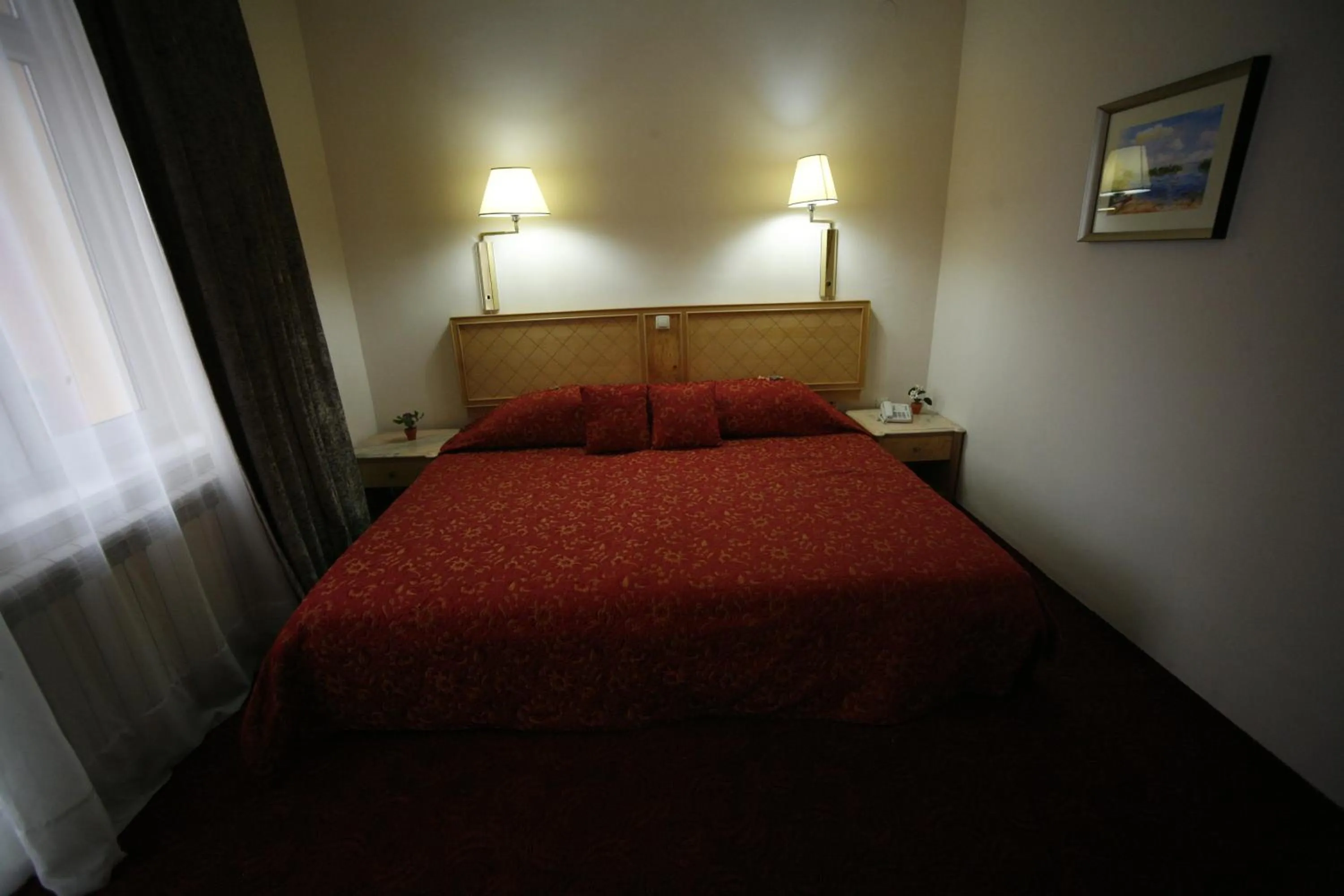 Bed in Golden Inn Hotel