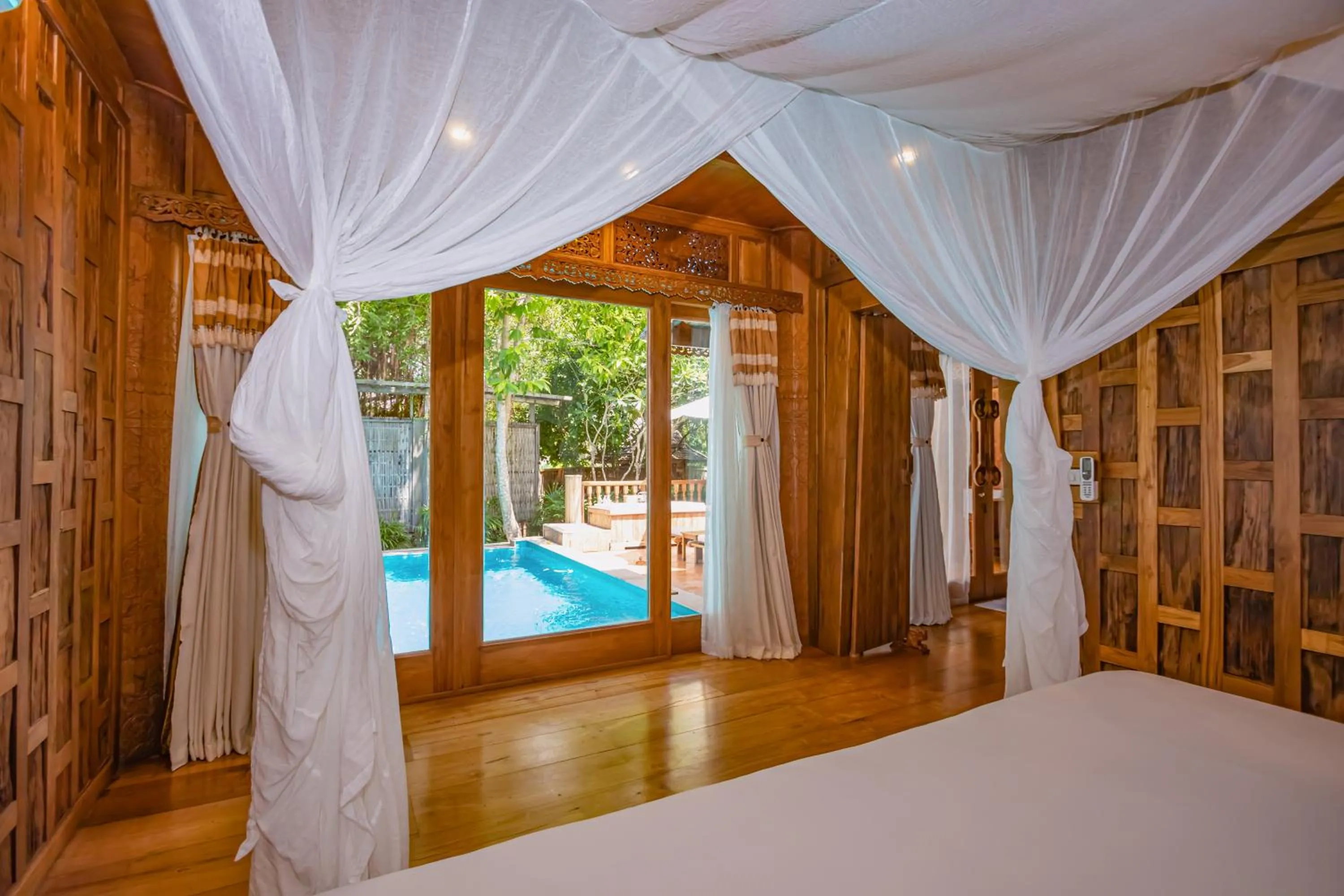 Pool view, Bed in Santhiya Phuket Natai Resort & Spa