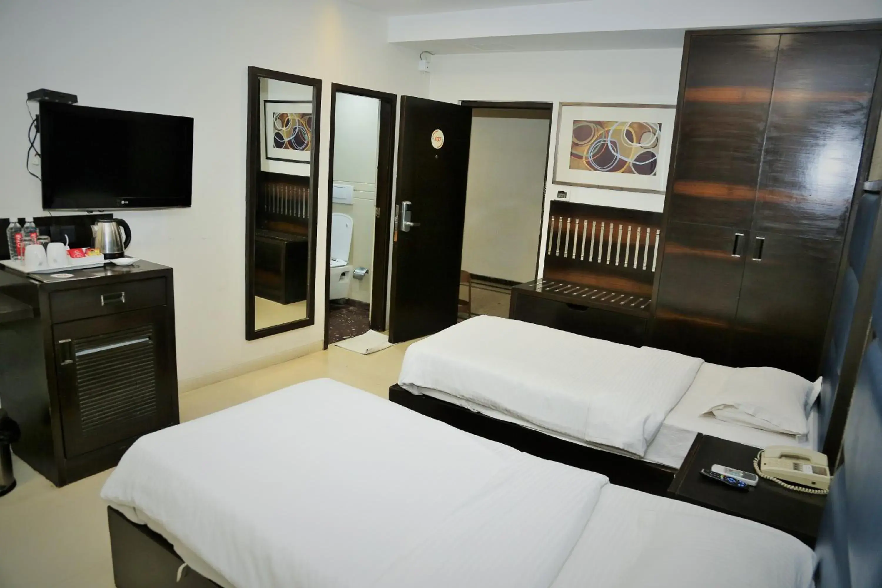 Superior Twin Room - single occupancy in Ginger Ahmedabad, Satellite Superior Twin Room - single occupancy in Ginger Ahmedabad, Satellite